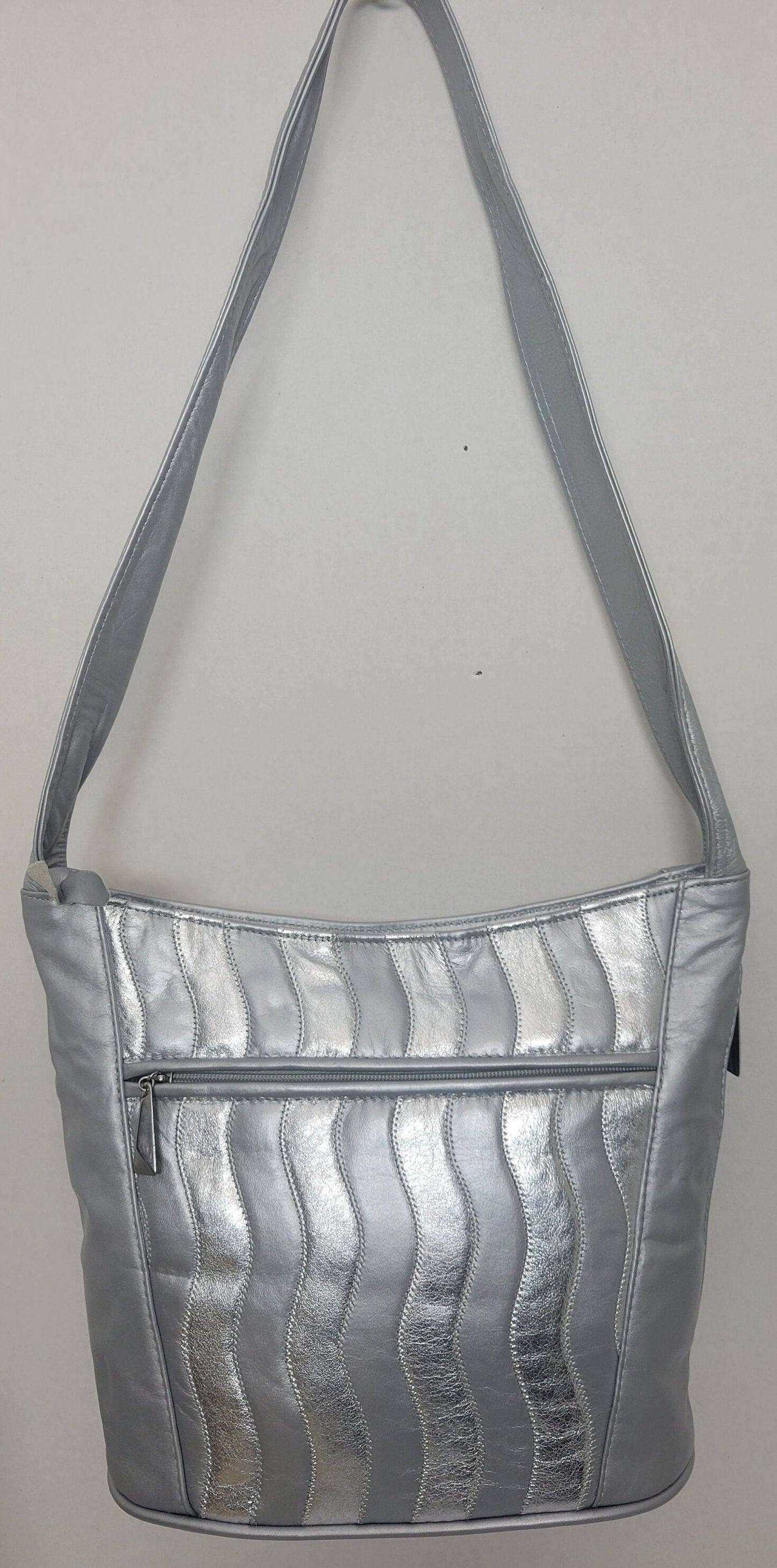 Tejrasila-Silver Grey with silver shining leather handbag!Zigzag designe. 3 outside pockets.Made in USA!