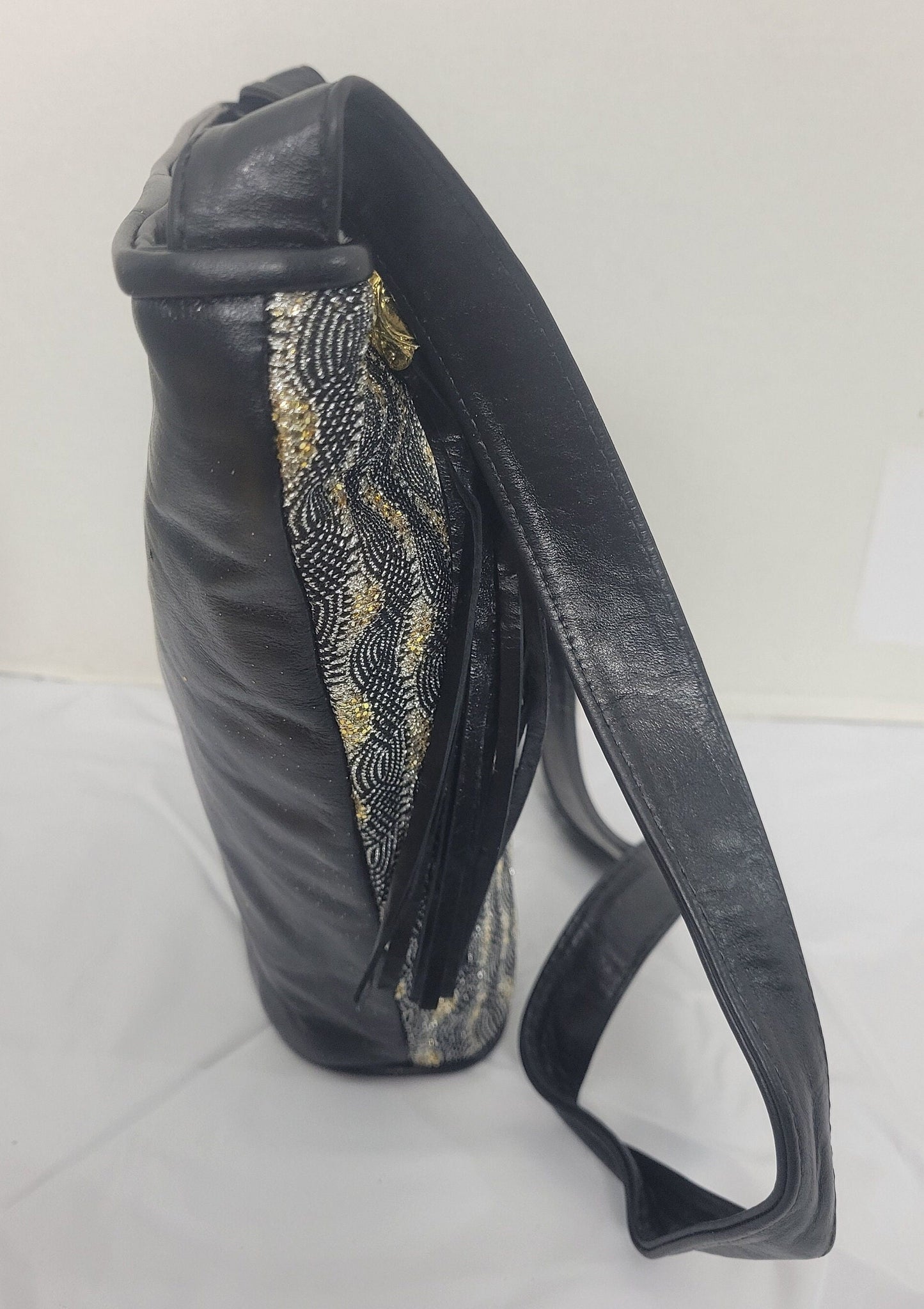 Leather Shoulder Handbag for women. Black with Silver Gold Black Glitters Fabrice Design on front side only. Made In US