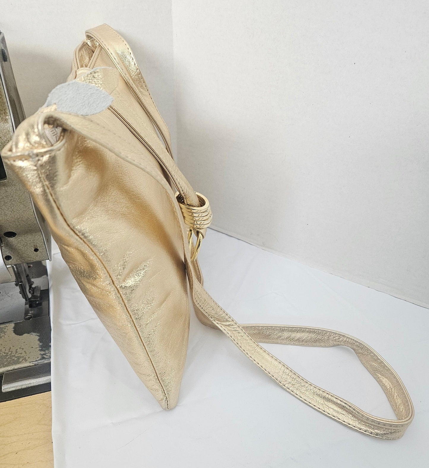 Shinning Gold with Gold matel Rings Genuine Leather Handbag for all. Tejrasila-Ring Purse. Made in USA. Design for you.