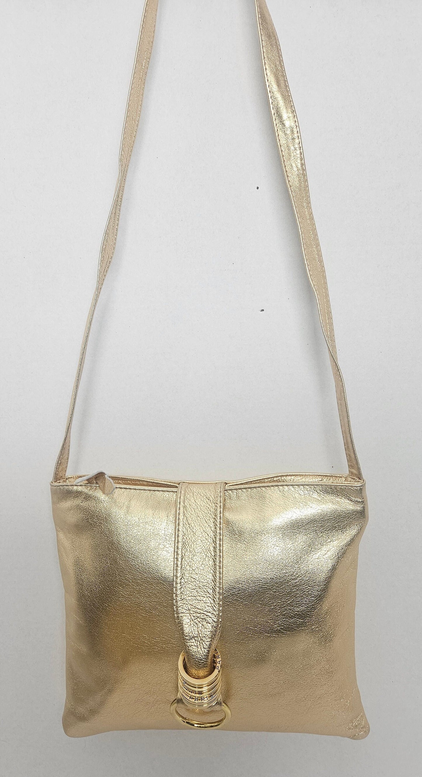 Shinning Gold with Gold matel Rings Genuine Leather Handbag for all. Tejrasila-Ring Purse. Made in USA. Design for you.