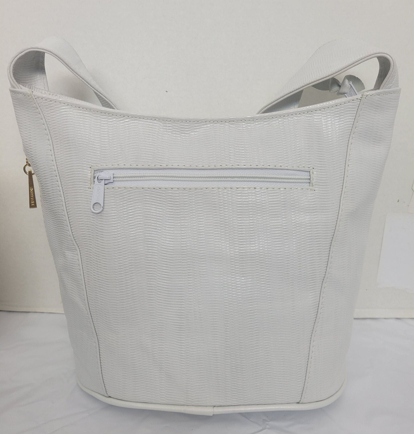 Tejrasila-Beautiful White print genuine leather handbag! Three outside pockets.Made in USA!