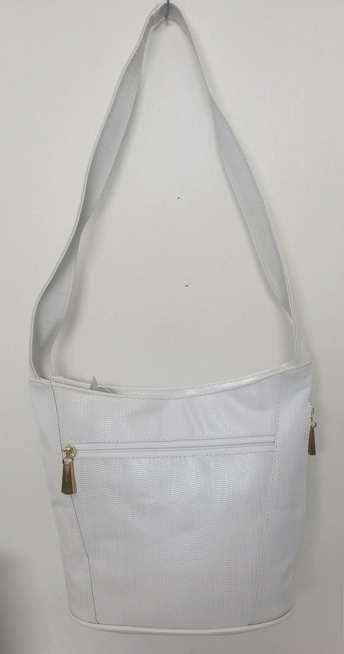 Tejrasila-Beautiful White print genuine leather handbag! Three outside pockets.Made in USA!