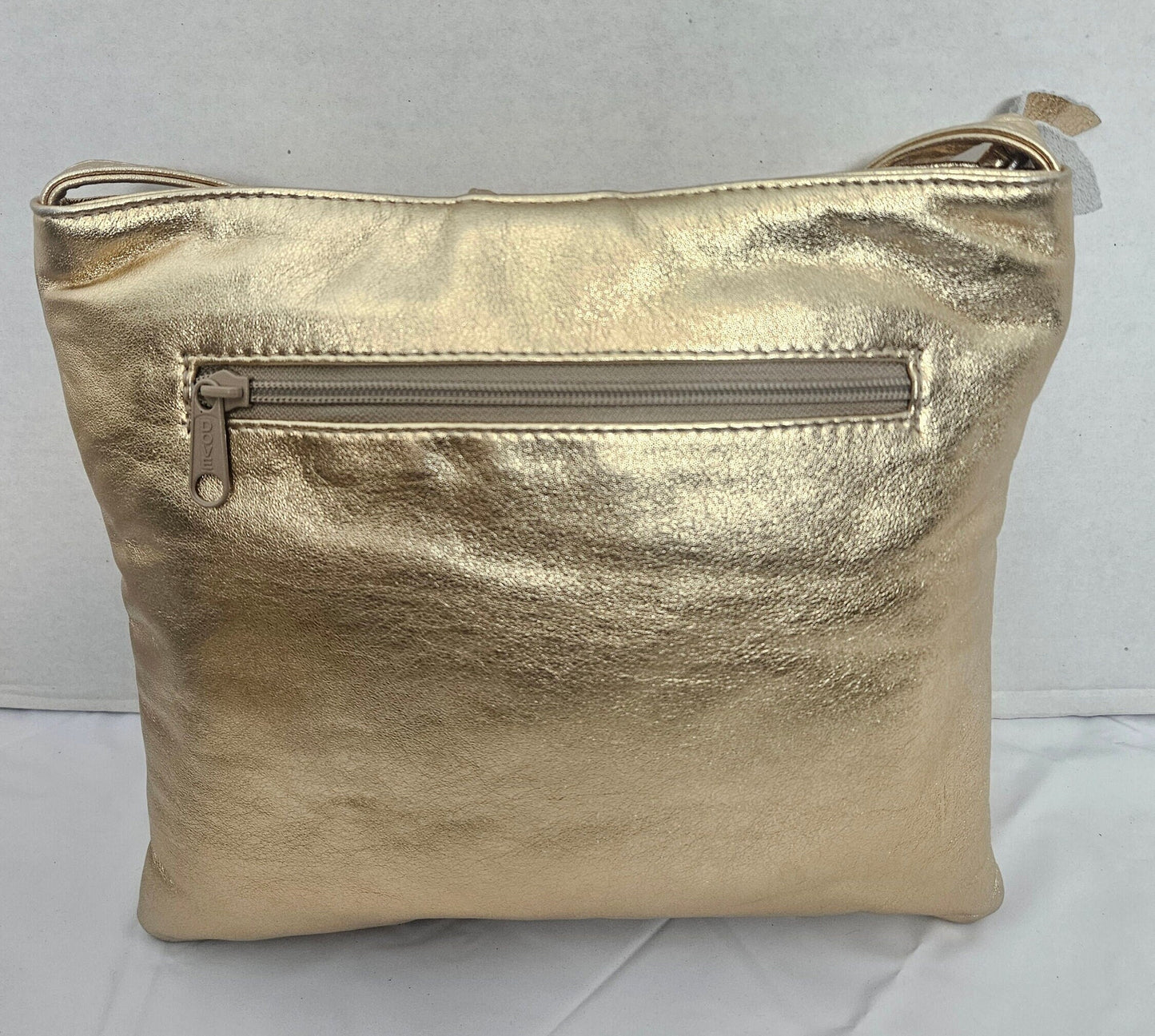 Shinning Gold with Gold matel Rings Genuine Leather Handbag for all. Tejrasila-Ring Purse. Made in USA. Design for you.