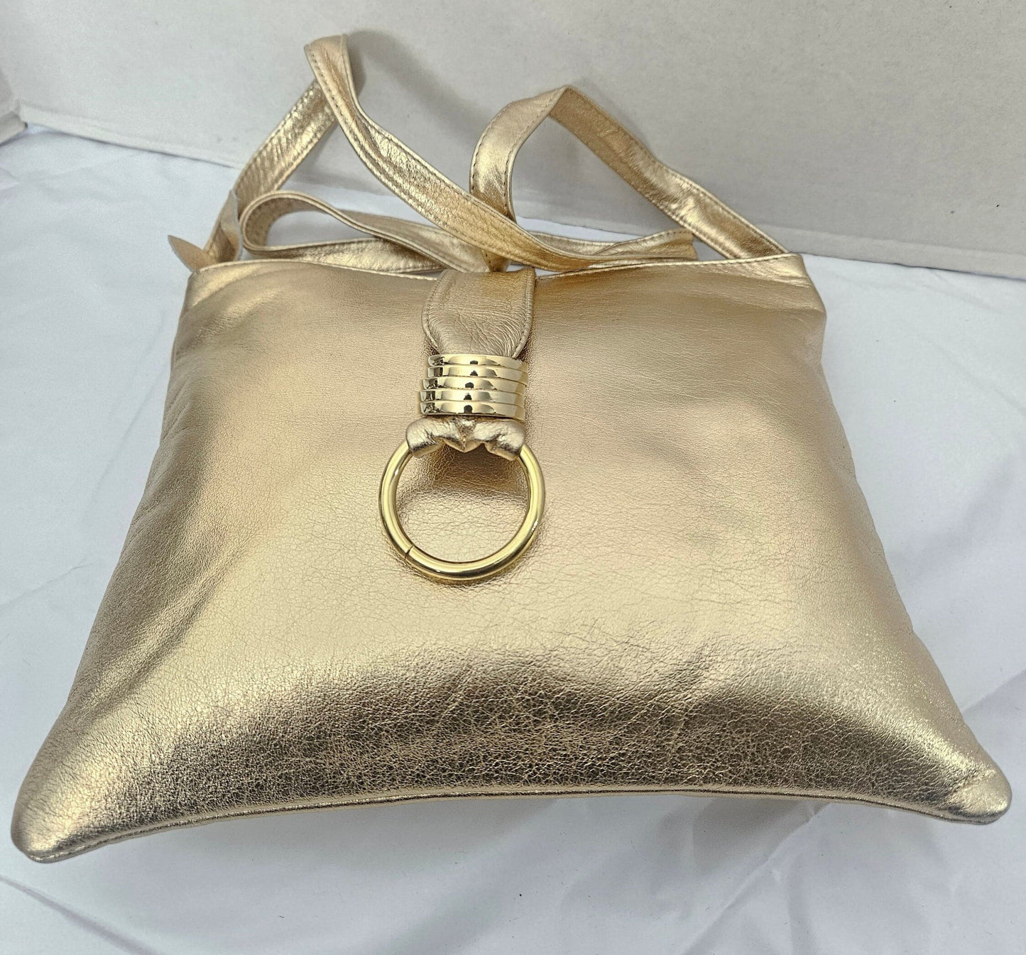 Shinning Gold with Gold matel Rings Genuine Leather Handbag for all. Tejrasila-Ring Purse. Made in USA. Design for you.