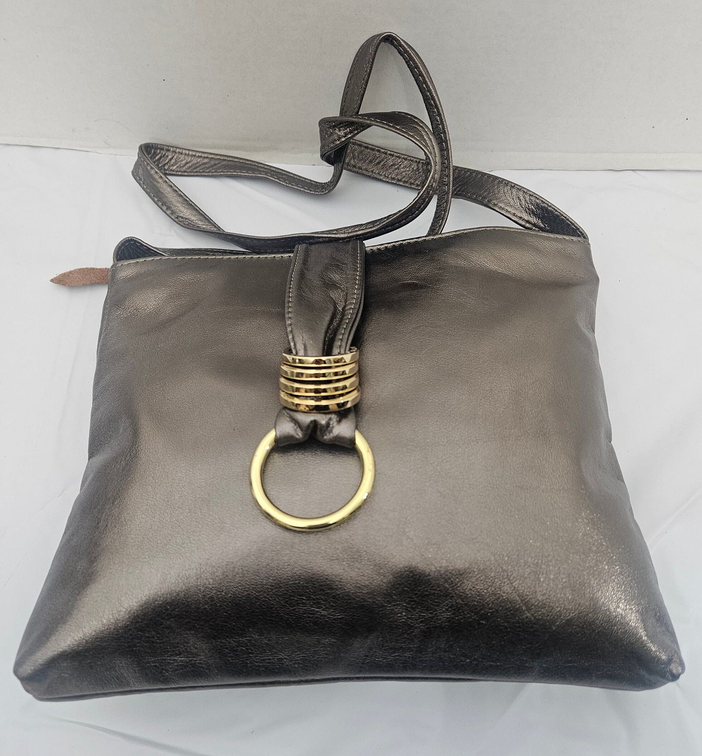 Shinning Pewter with Gold matel Rings Genuine Leather Handbag for all. Tejrasila-Ring Purse. Made in USA. Design for you.