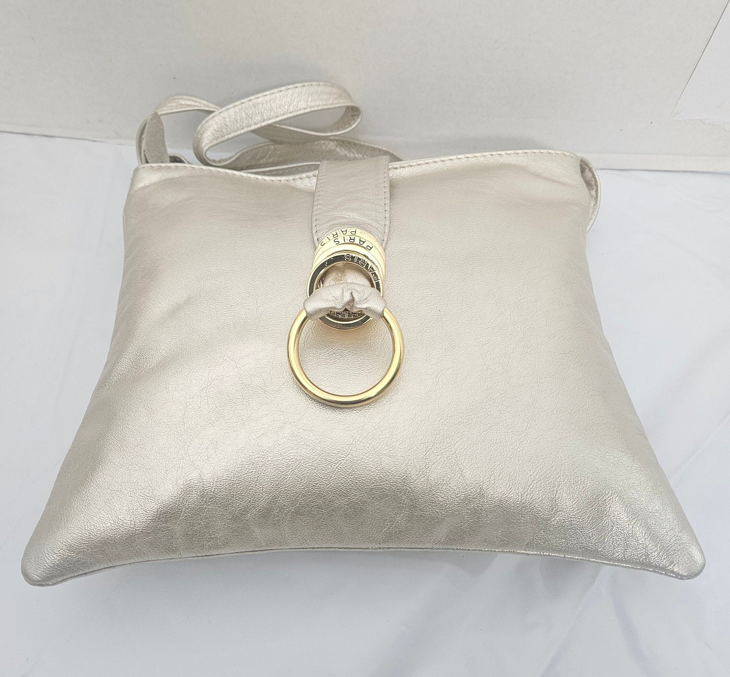 Shining cream with Gold matel Rings Genuine Leather Handbag for all. Tejrasila-Ring Purse. Made in USA. Design for you.