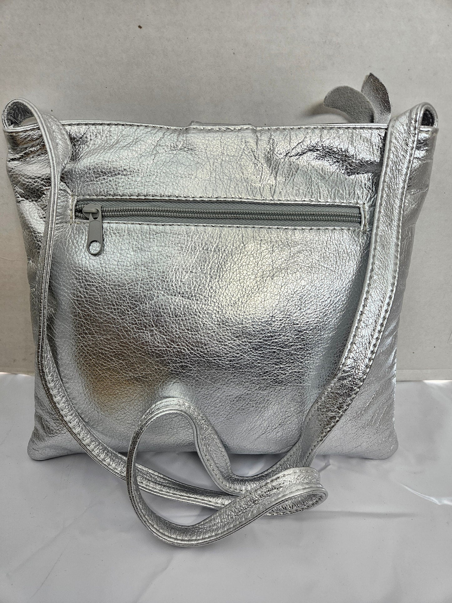 Shining Silver with Silver matel Rings Genuine Leather Handbag for all. Tejrasila-Ring Purse. Made in USA. Design for you.
