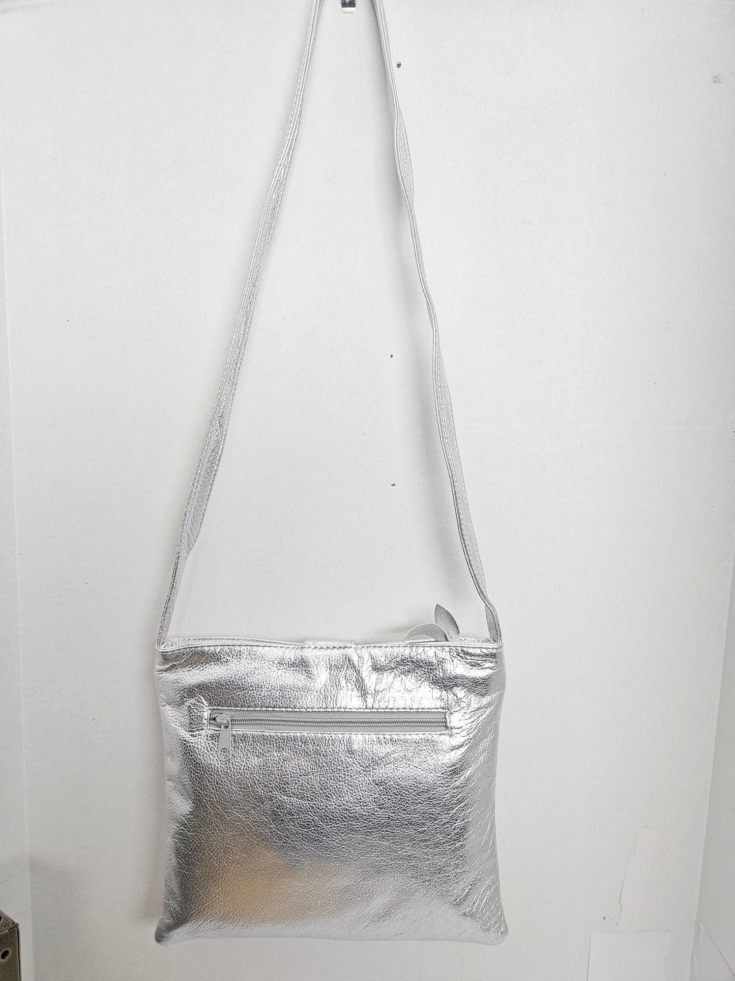 Shining Silver with Silver matel Rings Genuine Leather Handbag for all. Tejrasila-Ring Purse. Made in USA. Design for you.