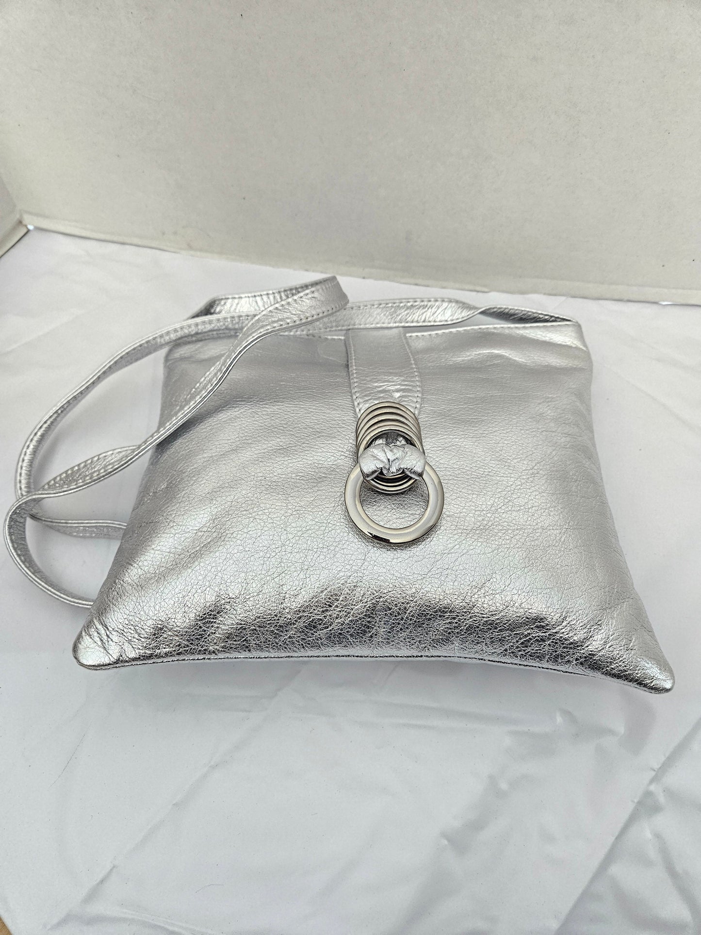 Shining Silver with Silver matel Rings Genuine Leather Handbag for all. Tejrasila-Ring Purse. Made in USA. Design for you.