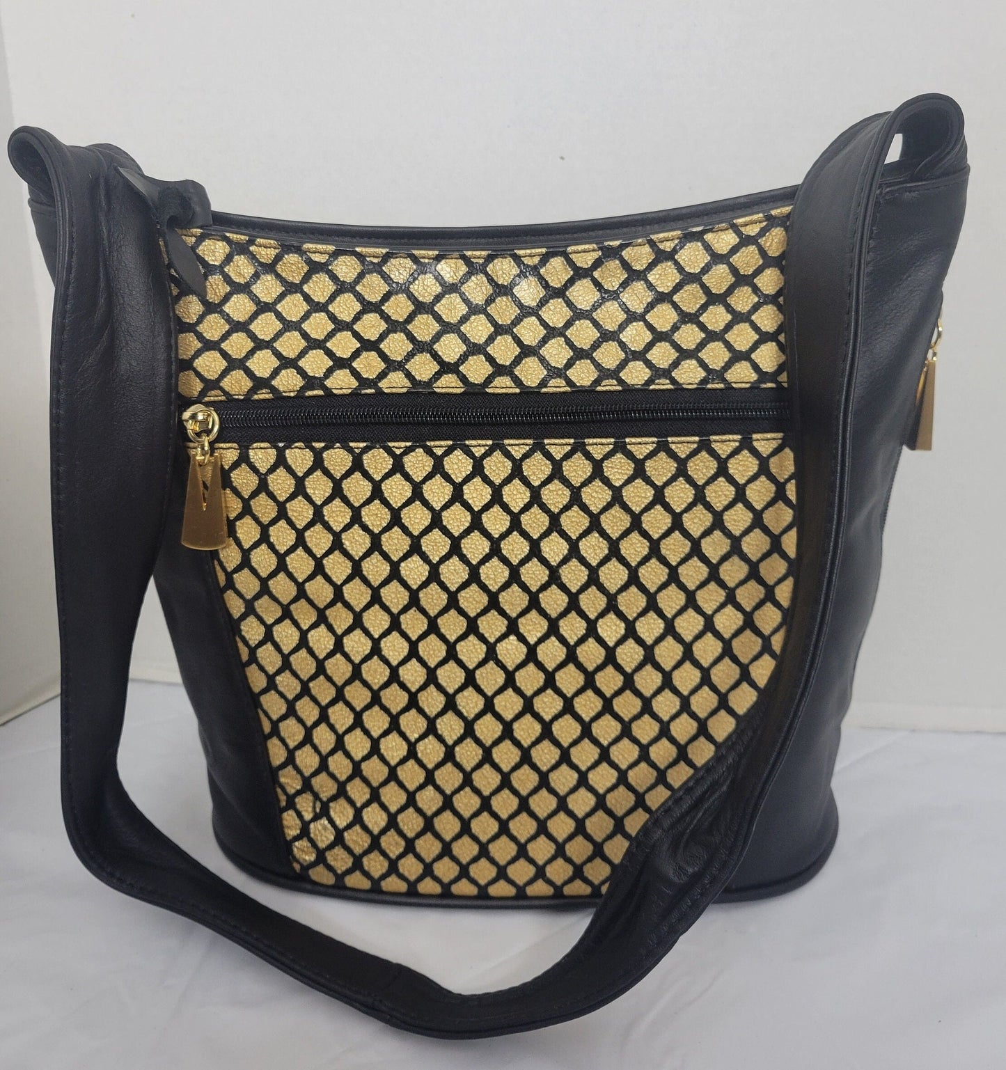 Tejrasila-Black with gold print genuine leather Shoulder handbag! Three outside pockets.Made in USA!
