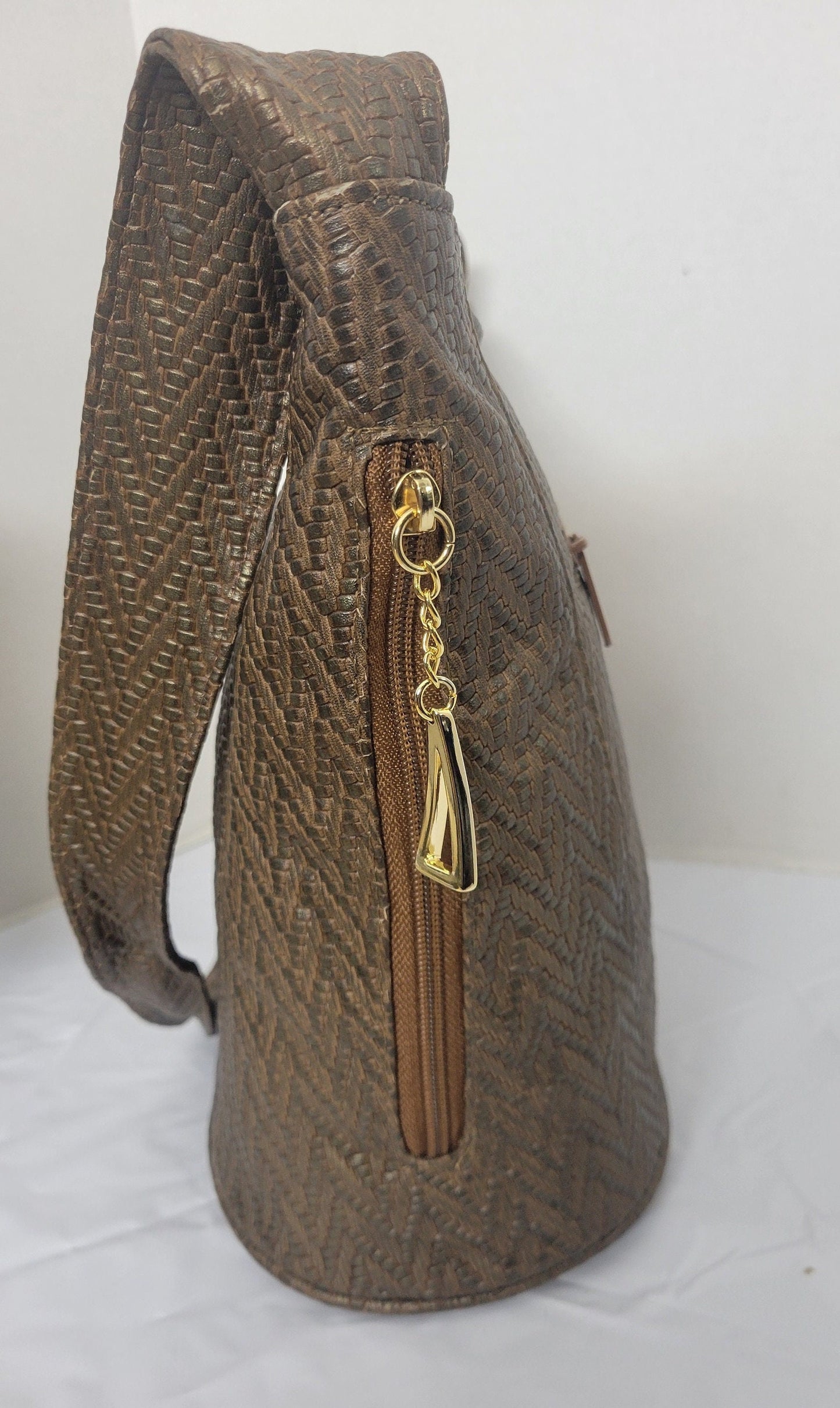 Tejrasila-Khaki print women's Shoulder handbag! Three outside pockets.Made with genuine leather in USA!