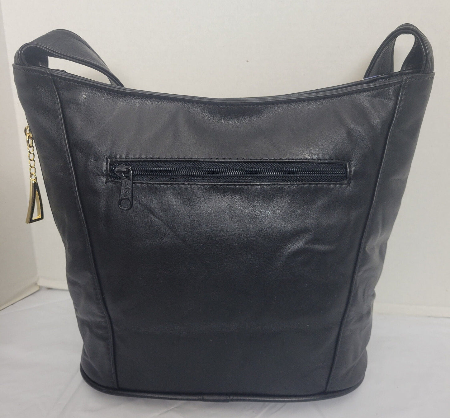 Tejrasila-Black with multi print genuine leather Shoulder handbag! Three outside pockets.Made in USA!