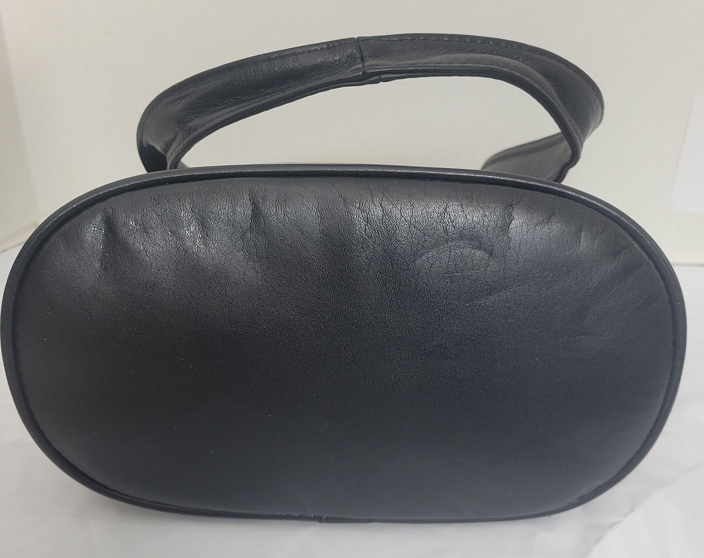 Tejrasila-Black with multi print genuine leather Shoulder handbag! Three outside pockets.Made in USA!