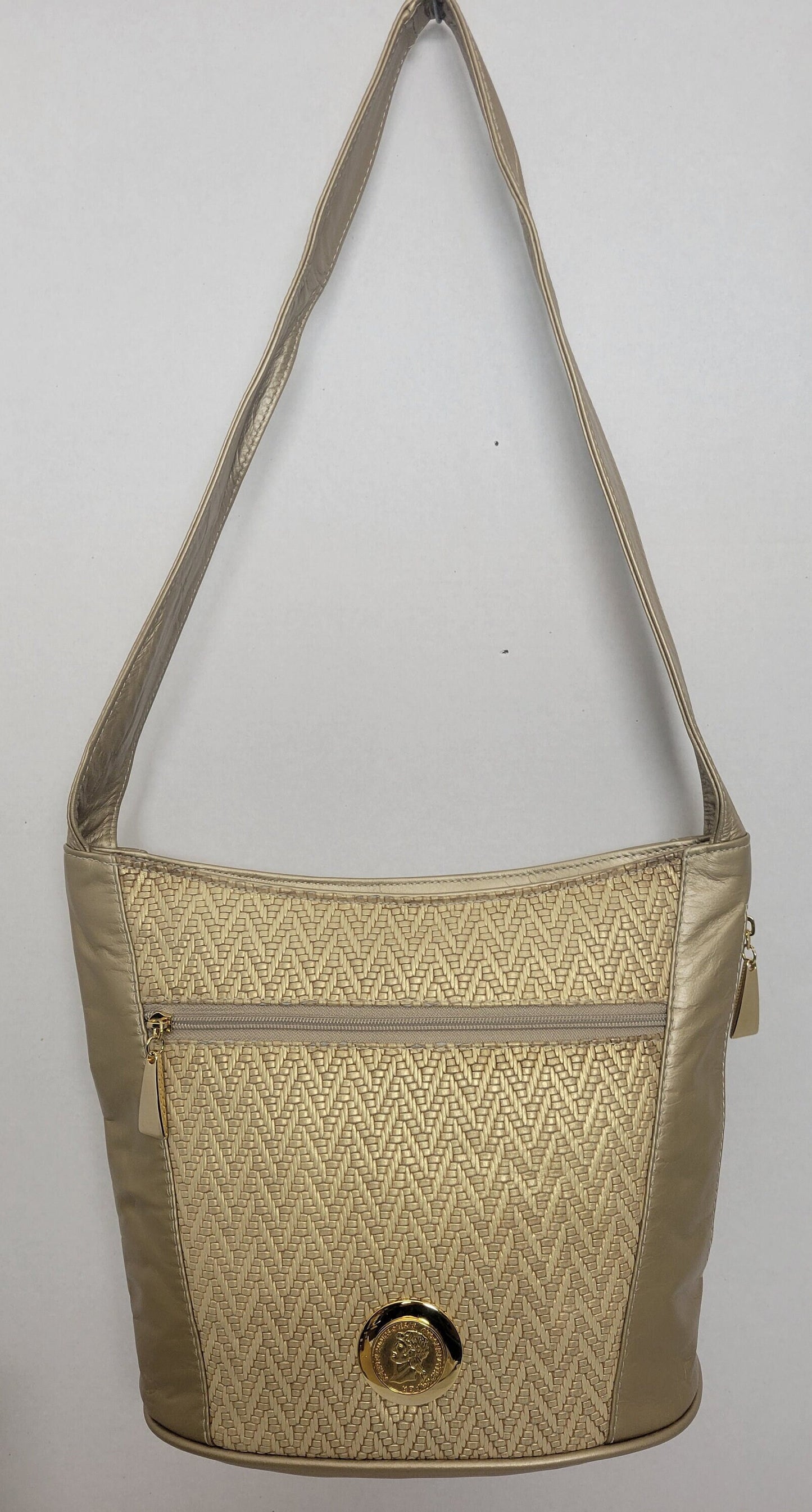 Tejrasila-Gold mate with gold print genuine leather, gold matel coin design Shoulder handbag! Three outside pockets.Made in USA!