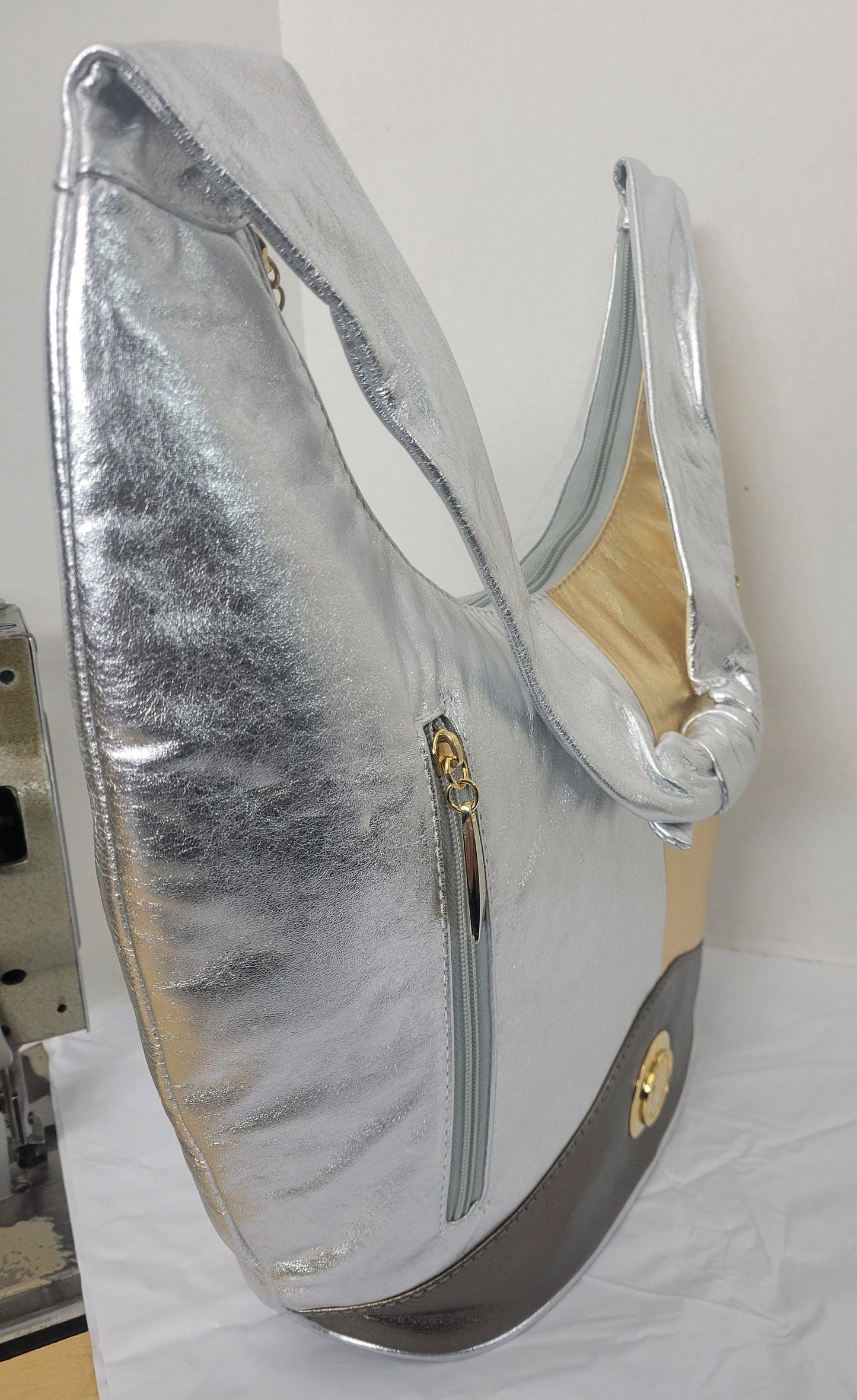 Tejrasila-Shining silver,gold,pewter with gold metal design Hobo genuine leather handbag!
