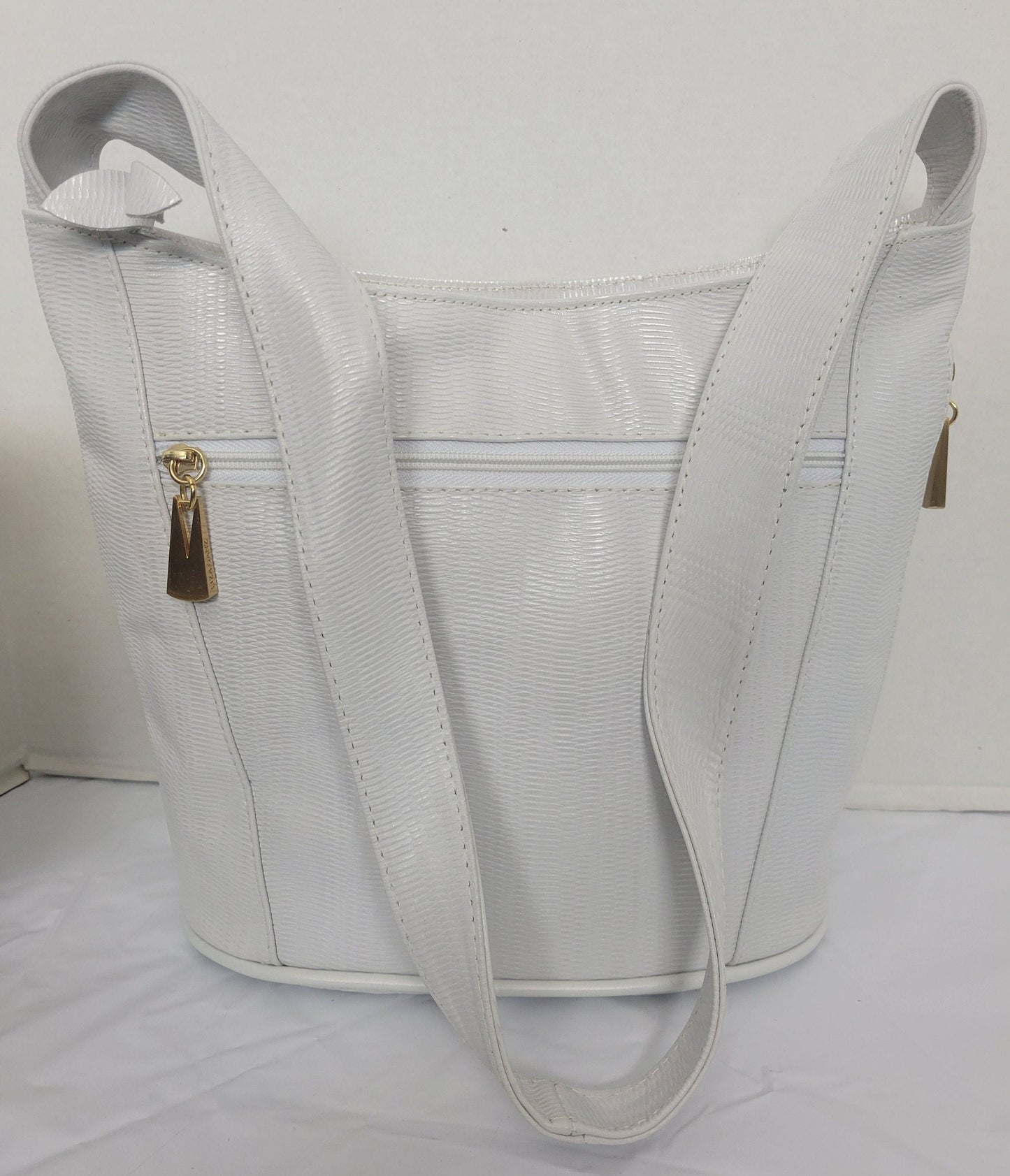 Tejrasila-Beautiful White print genuine leather handbag! Three outside pockets.Made in USA!