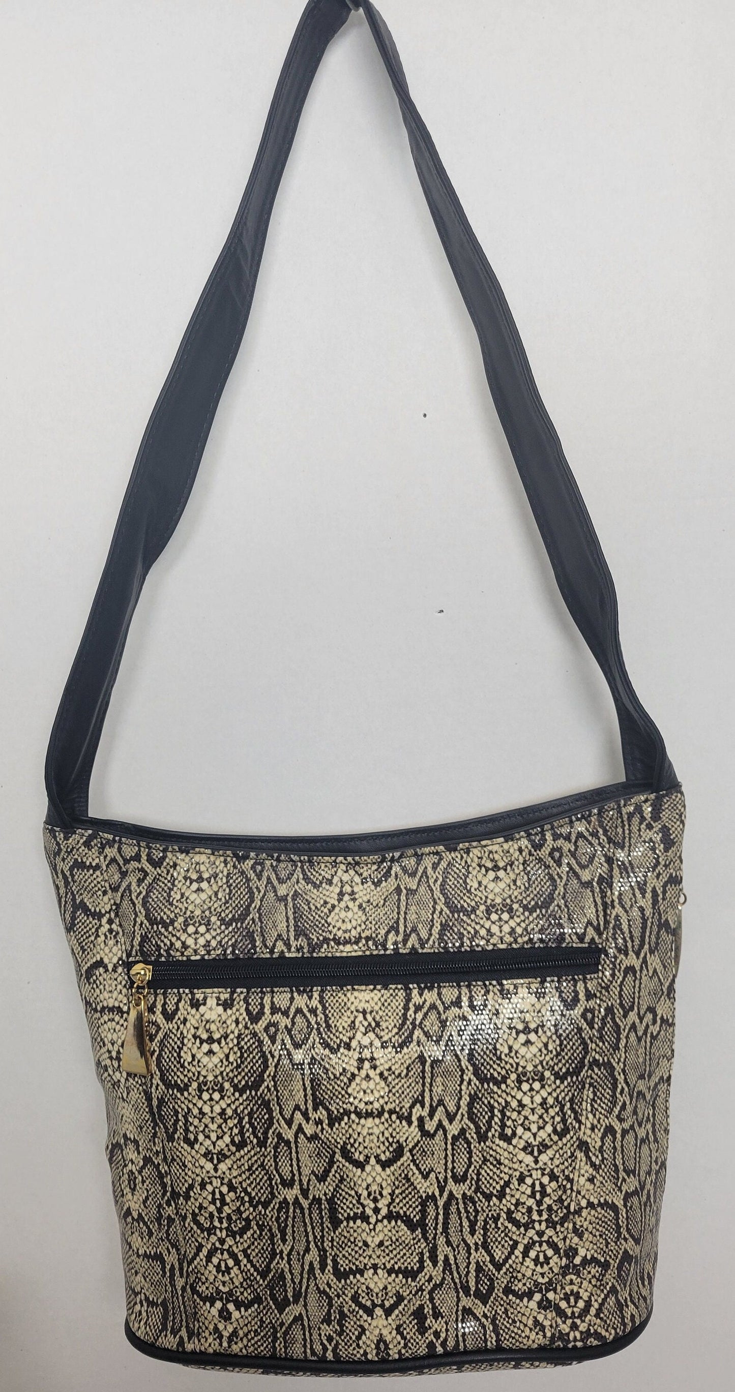 Tejrasila-Black with brown mix snake print fabric with genuine leather Shoulder handbag! Three outside pockets.Made in USA!