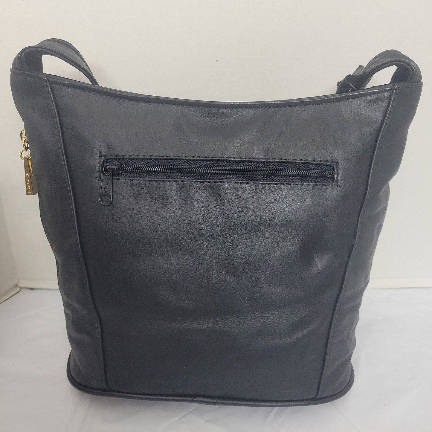 Tejrasila-Black with gold print genuine leather Shoulder handbag! Three outside pockets.Made in USA!