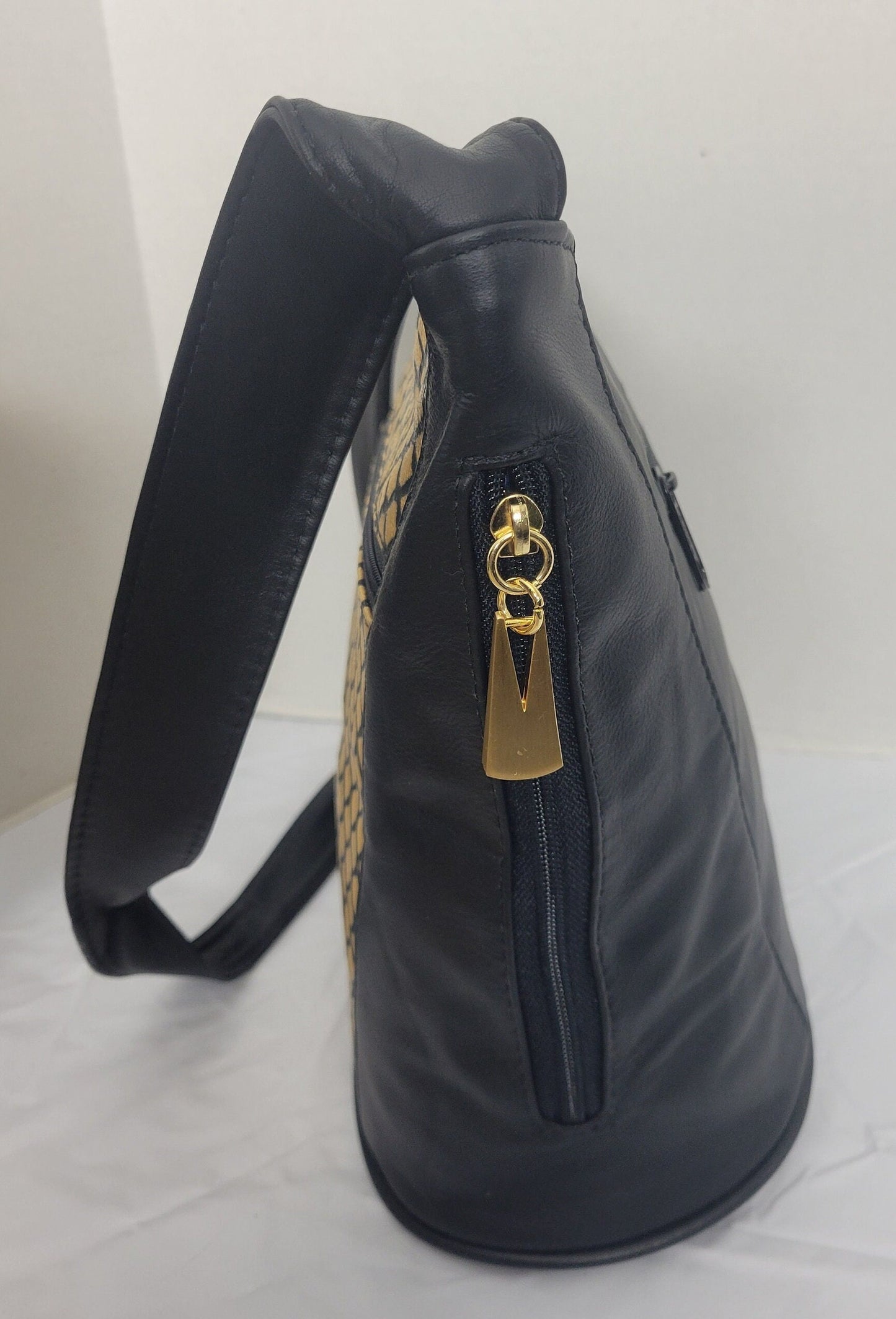 Tejrasila-Black with gold print genuine leather Shoulder handbag! Three outside pockets.Made in USA!