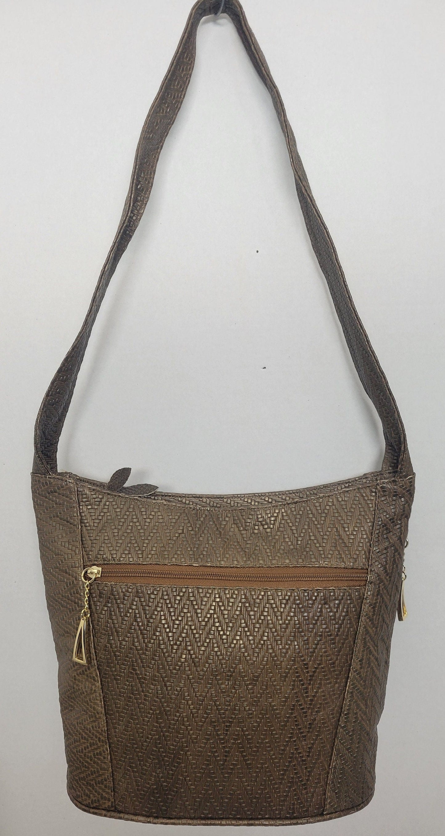Tejrasila-Khaki print women's Shoulder handbag! Three outside pockets.Made with genuine leather in USA!