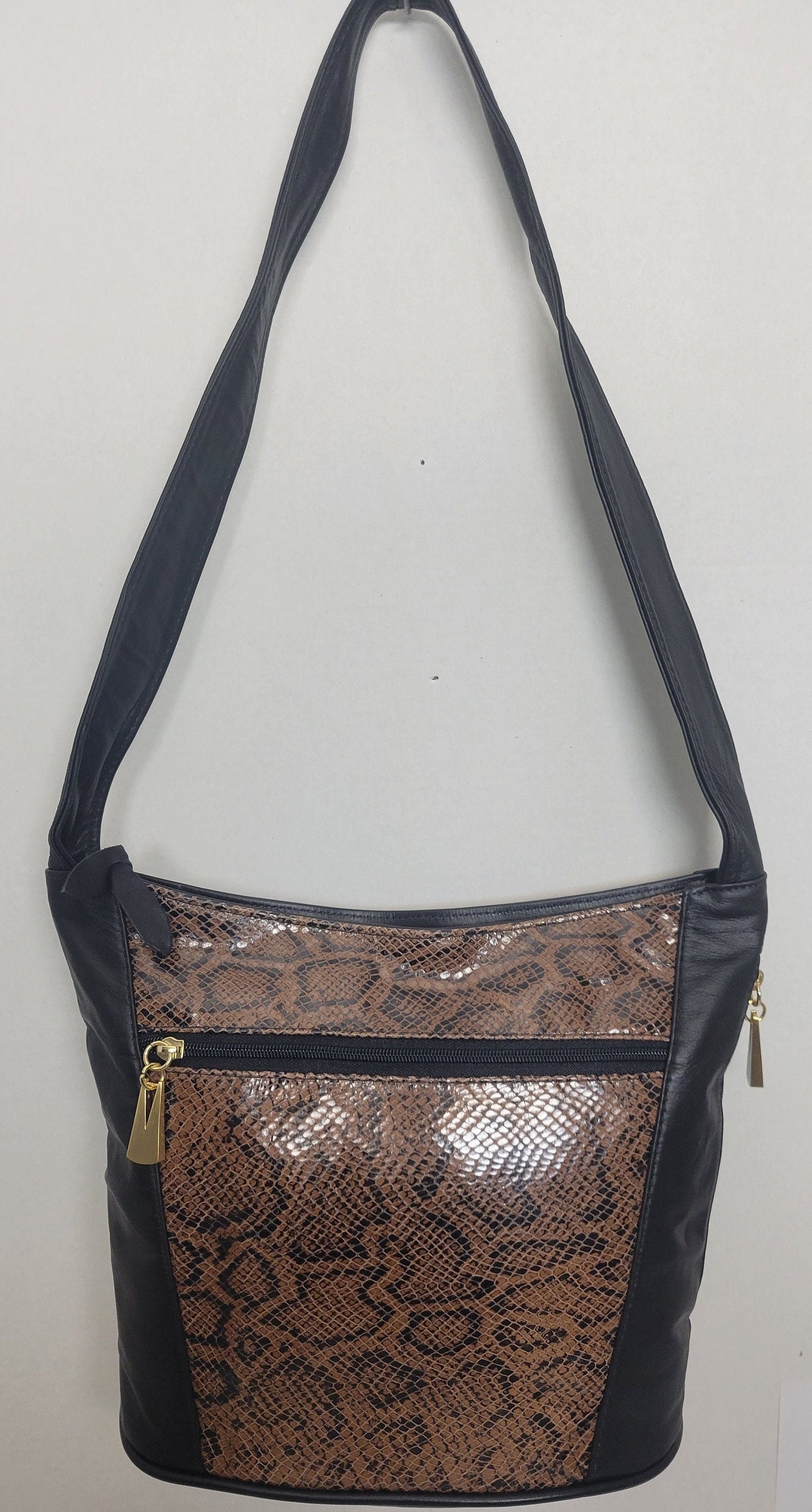 Tejrasila-Black with brown snake print genuine leather Shoulder handbag! Three outside pockets.Made in USA!