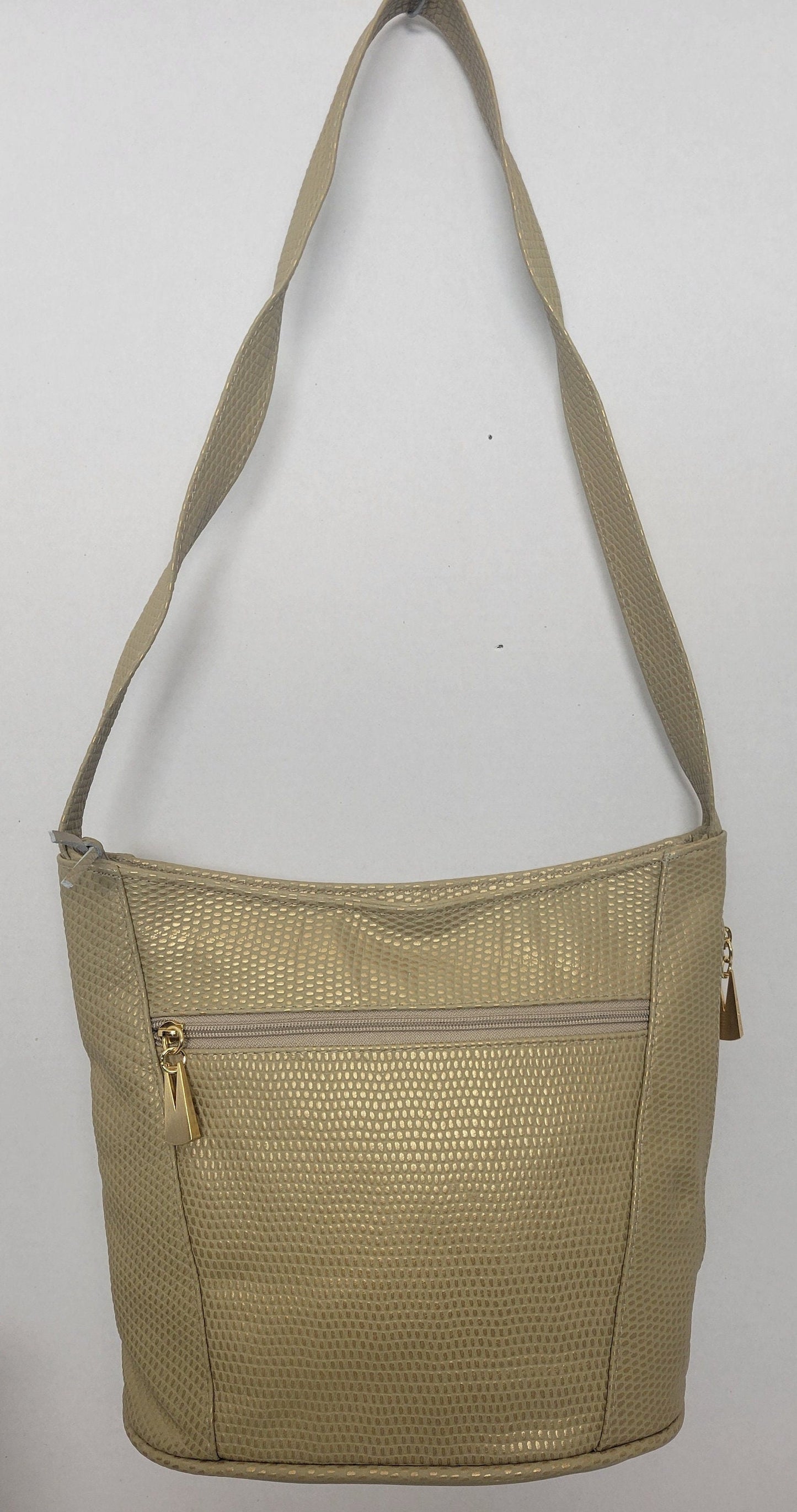 Tejrasila- Champagne print women's Shoulder handbag! Three outside pockets.Made with genuine leather in USA!