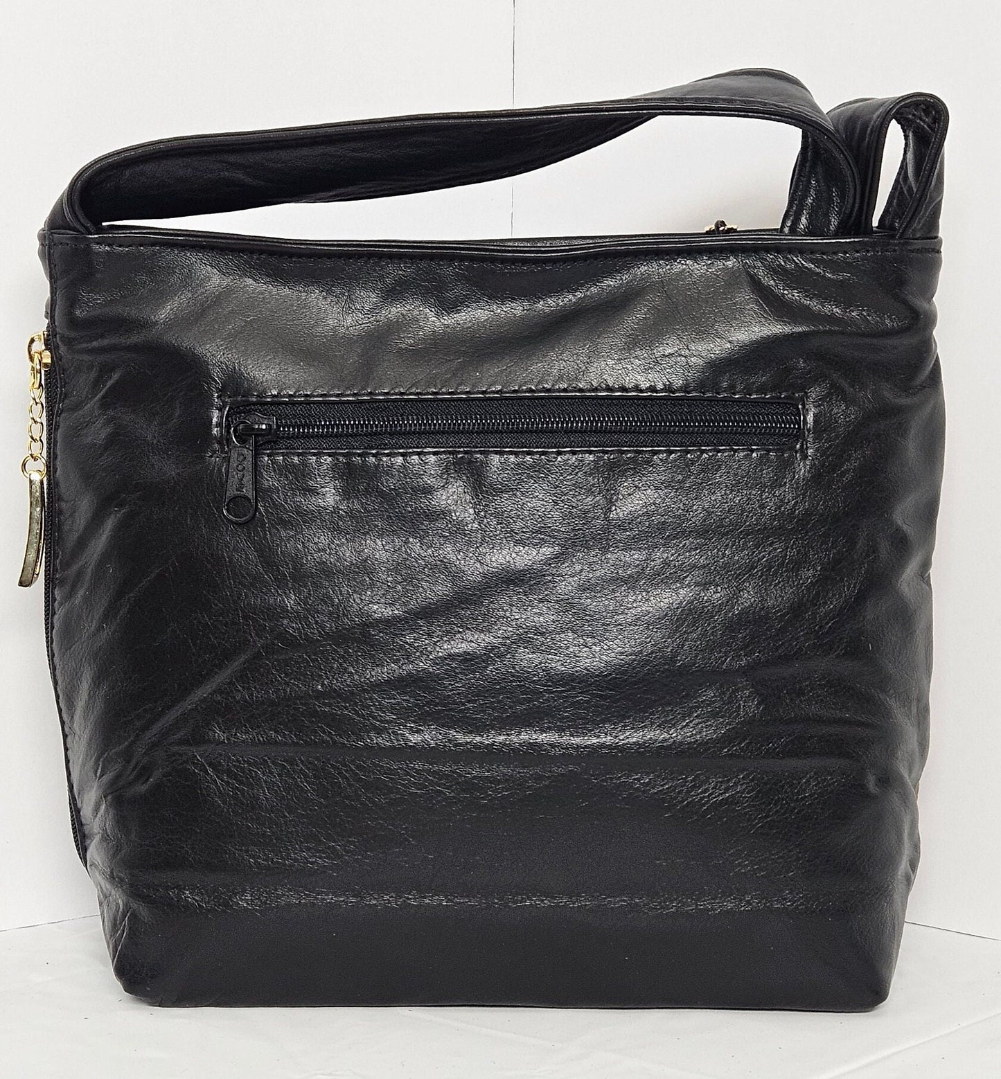 Tejrasila-Beautiful Camel print leather handbag!Good to carry everyday. Side pocket.Made in USA!