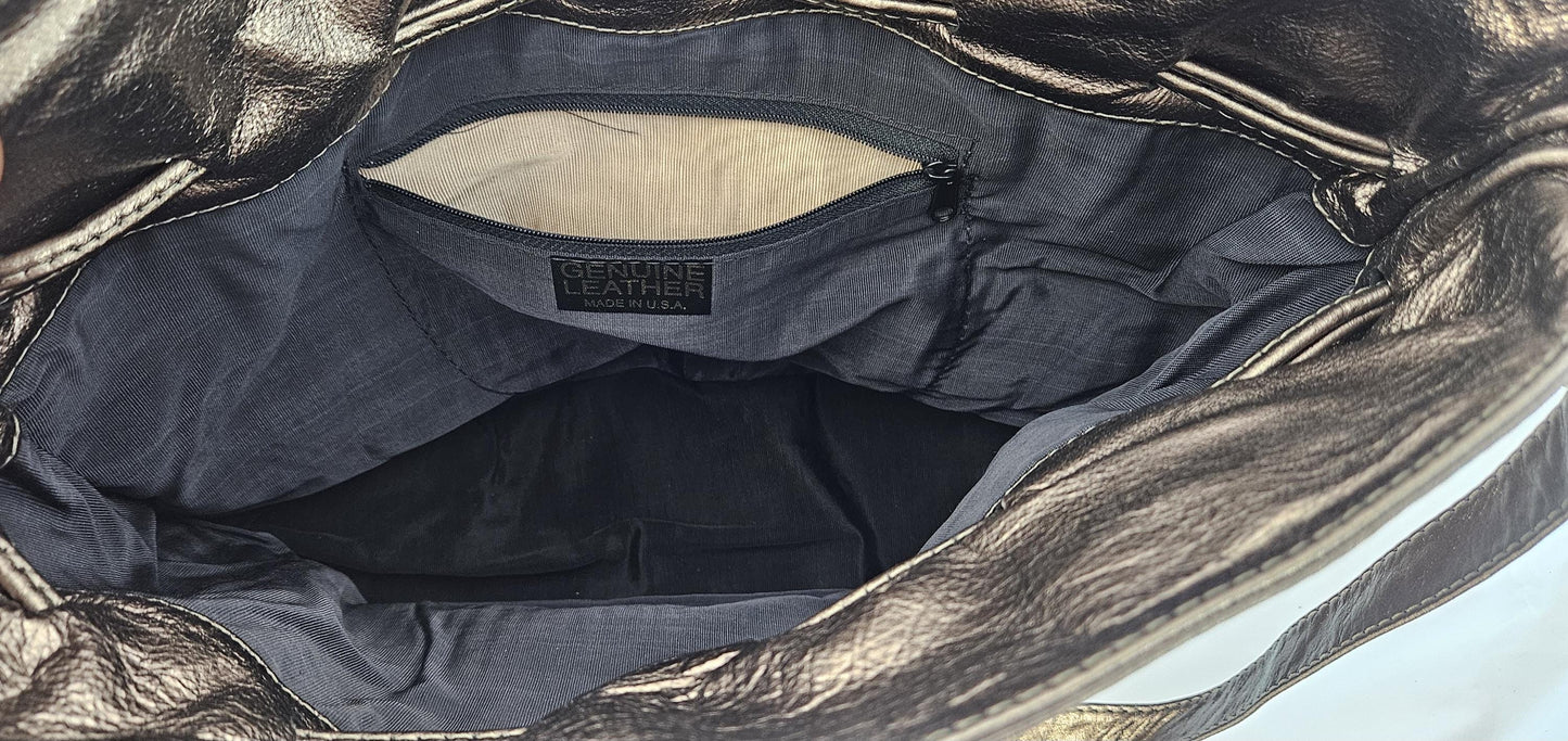Pewter shinning Genuine Leather with fabric zigzags stripes design. Item TR2031Ps-zig.Close with Drowsting Shoulders.Made in USA.