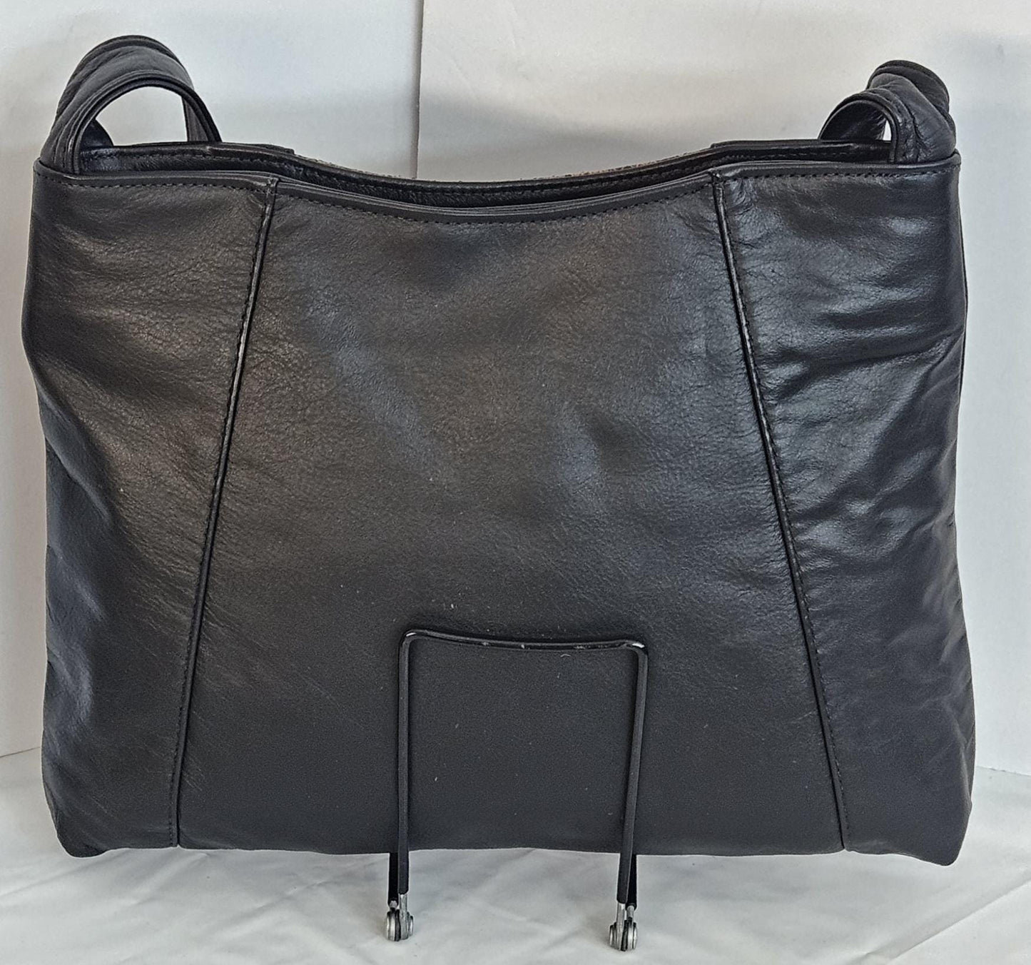 Black with black Brown print leather handbag! Two left and right pockets. TR9044Bbrp Made in USA.