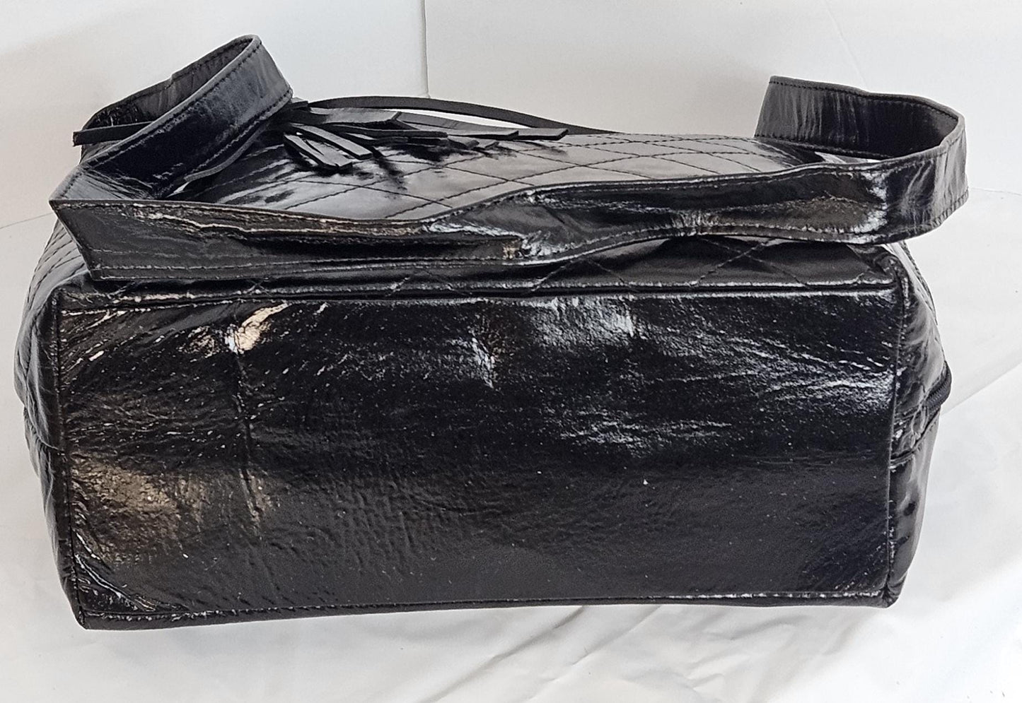 Black Patton Print Leather Handbag: Quilted Stitch Design, Side Pocket