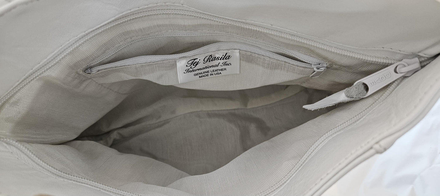 White leather handbag! Two left and right pockets. Made in USA.#TR9044