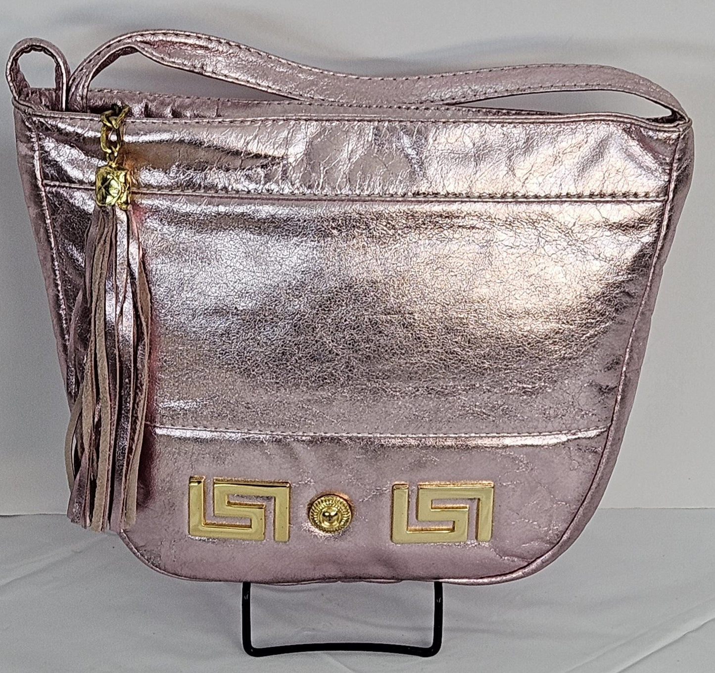 Pink metallic with Gold Z and Butten metal design on Leather Handbag. Item#Tr2030Pinkgz.Design for you.Made In USA!