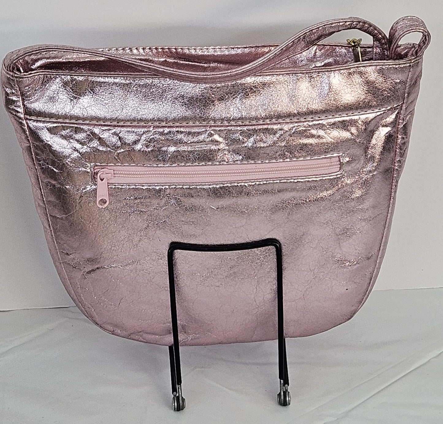Pink metallic with Gold Z and Butten metal design on Leather Handbag. Item#Tr2030Pinkgz.Design for you.Made In USA!