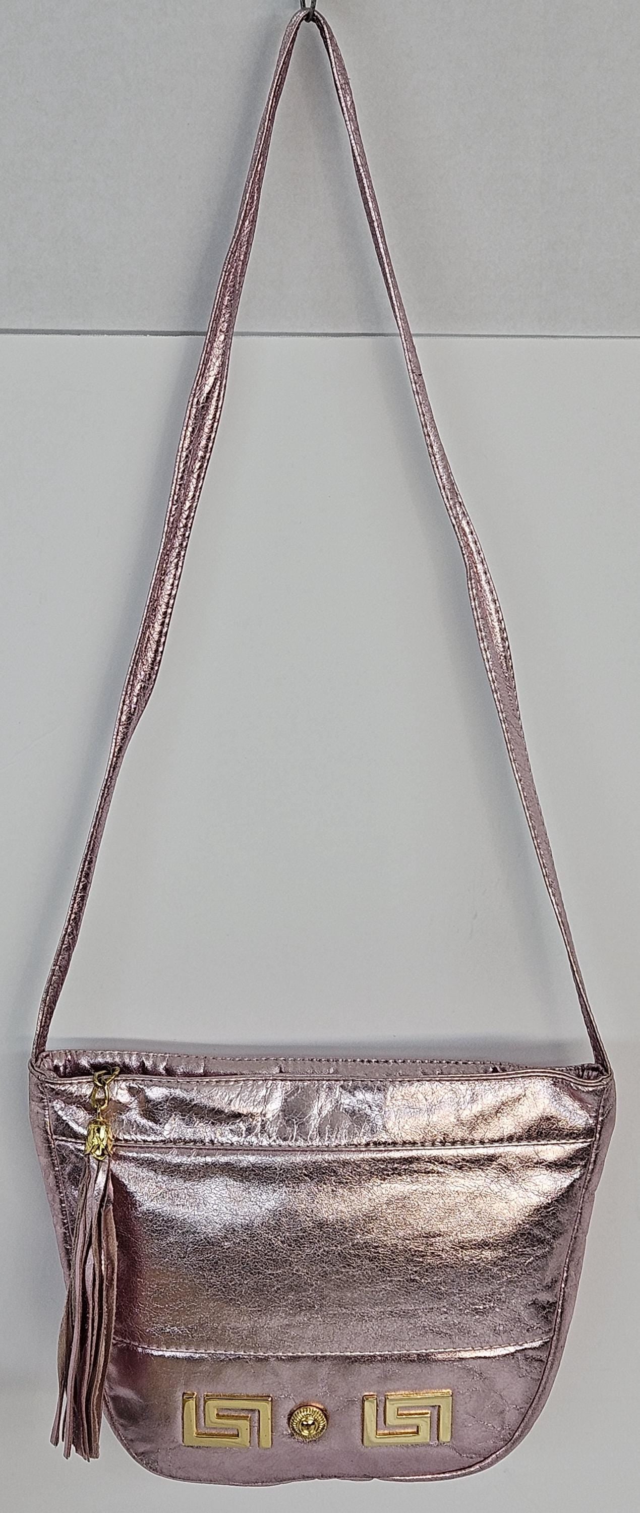 Pink metallic with Gold Z and Butten metal design on Leather Handbag. Item#Tr2030Pinkgz.Design for you.Made In USA!