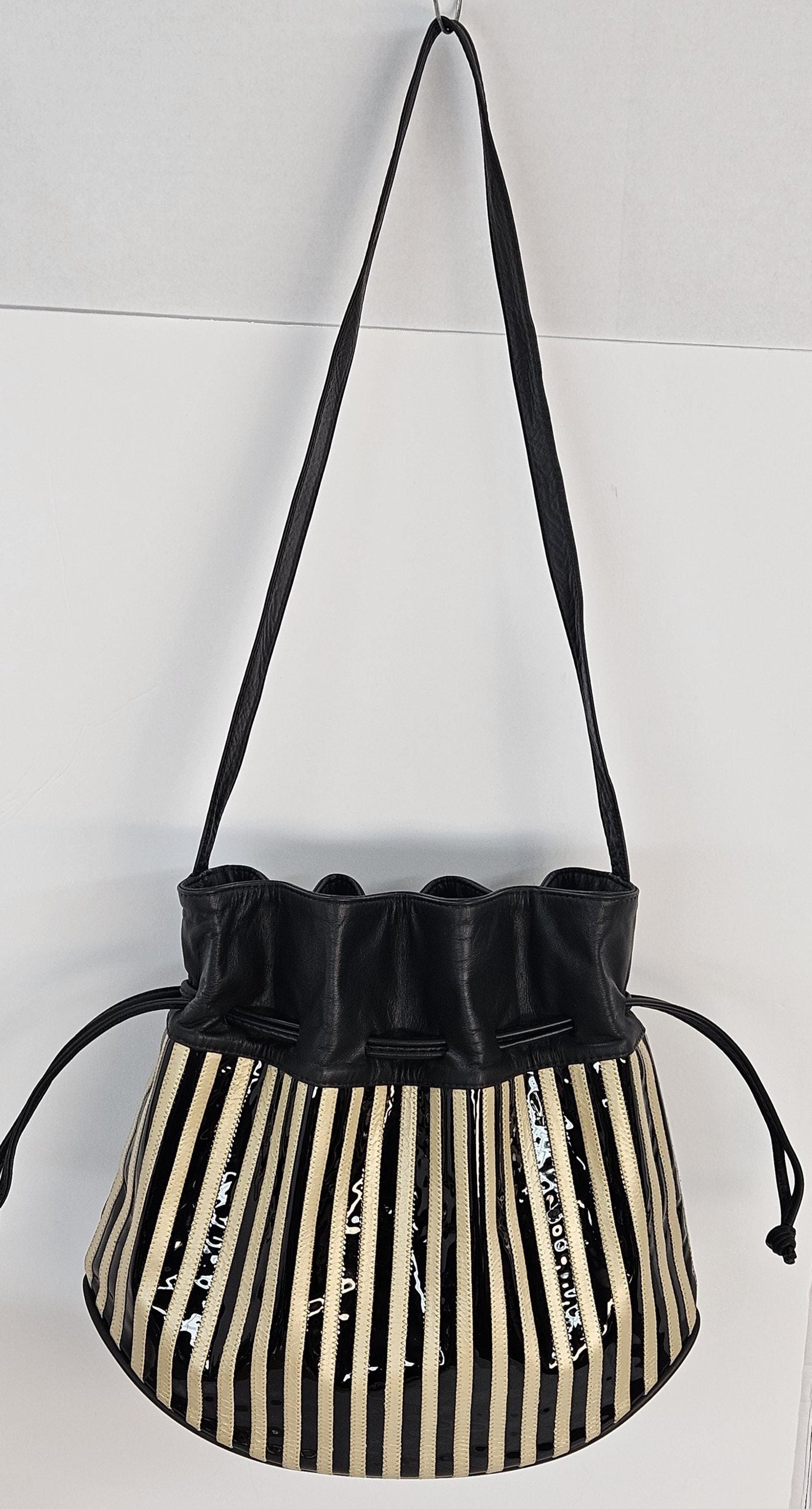 Black with black Patton zigzags stripes design. Item TR2031B,bk-p-zig.Close with Drowsting Shoulders.Made in USA.