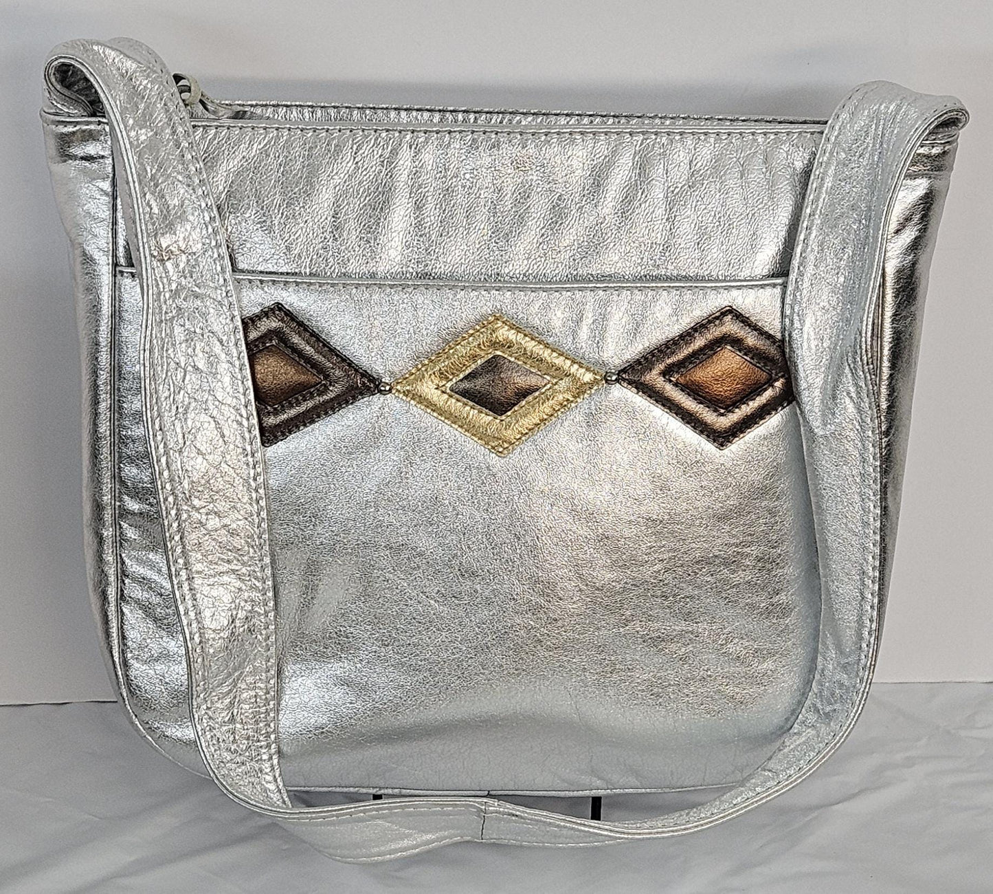 Silver metallic with gold,pewter,and bronze 3 diamonds cut Zigzag stich Design.Leather Handbag!Made in USA.#Tr8003Sm3dz.