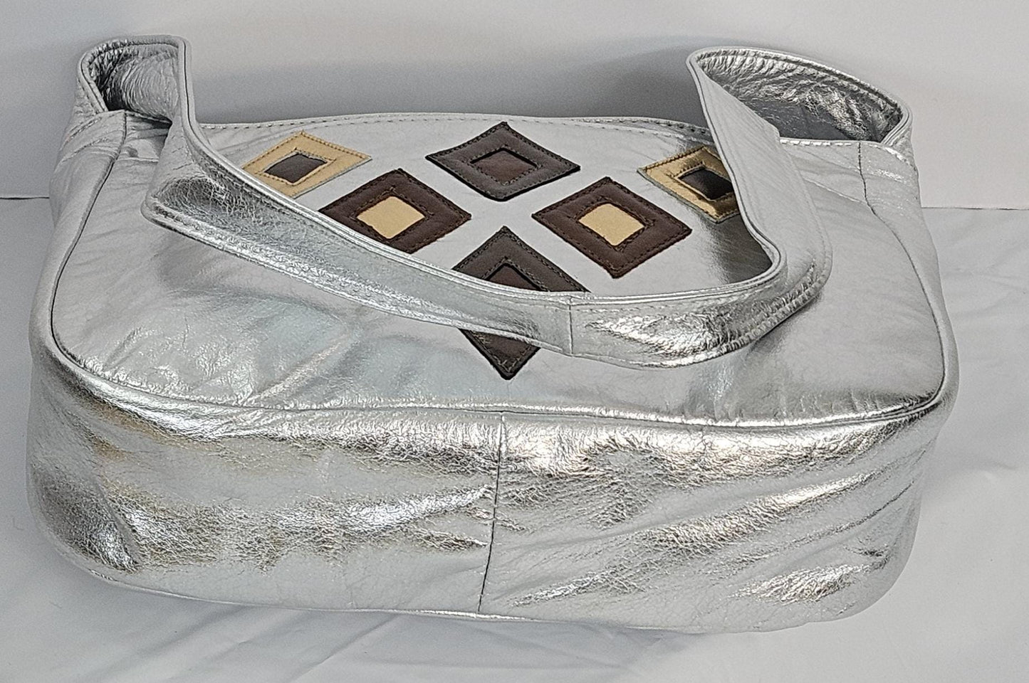 Silver metallic with gold,pewter,and bronze 6 diamonds cut Zigzag stich.Leather Handbag!Made in USA.#Tr8003Sm6dz.
