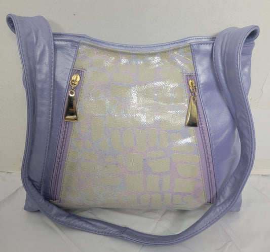 Purple with purple Two tone print leather handbag! Two left and right pockets. Made in USA.