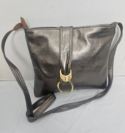 Shinning Pewter with Gold matel Rings Genuine Leather Handbag for all. Tejrasila-Ring Purse. Made in USA. Design for you.