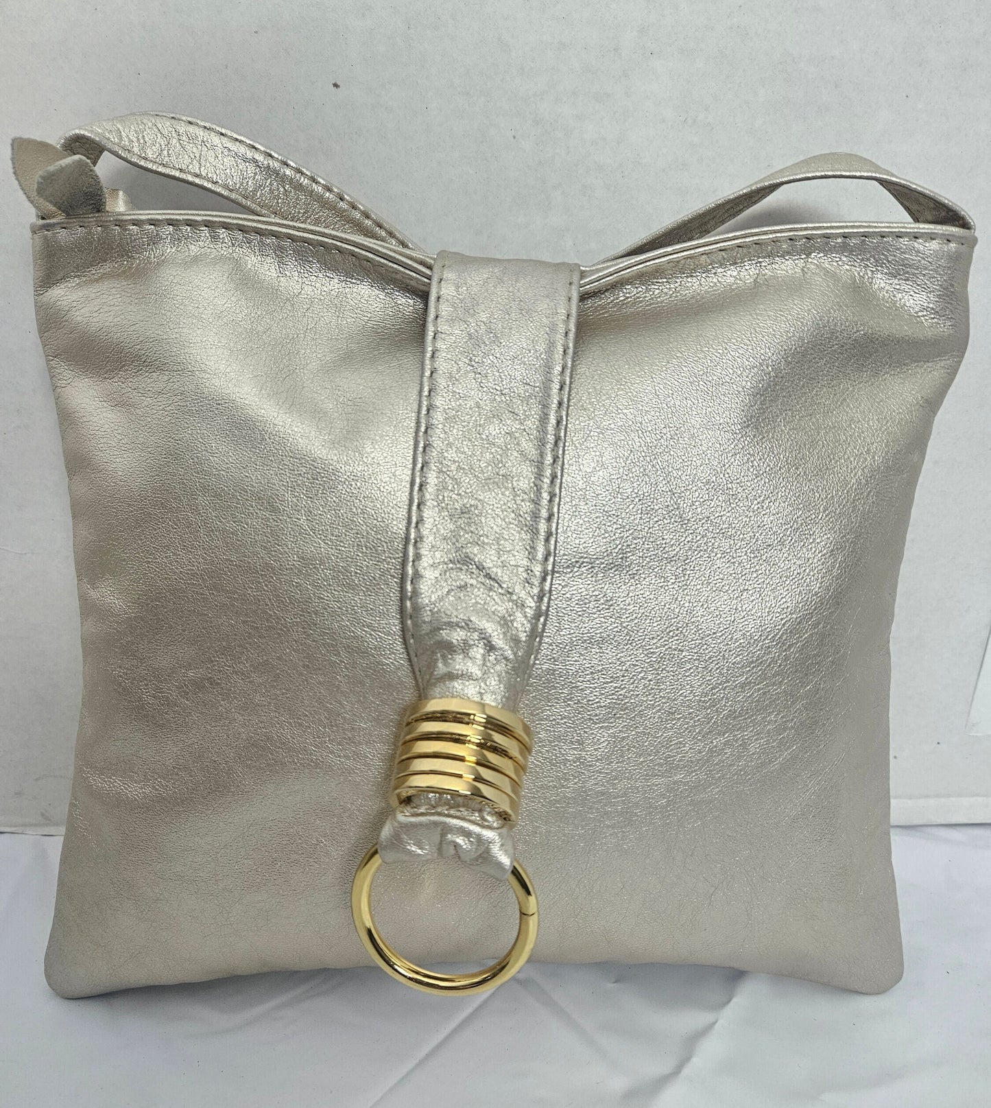 Shining cream with Gold matel Rings Genuine Leather Handbag for all. Tejrasila-Ring Purse. Made in USA. Design for you.