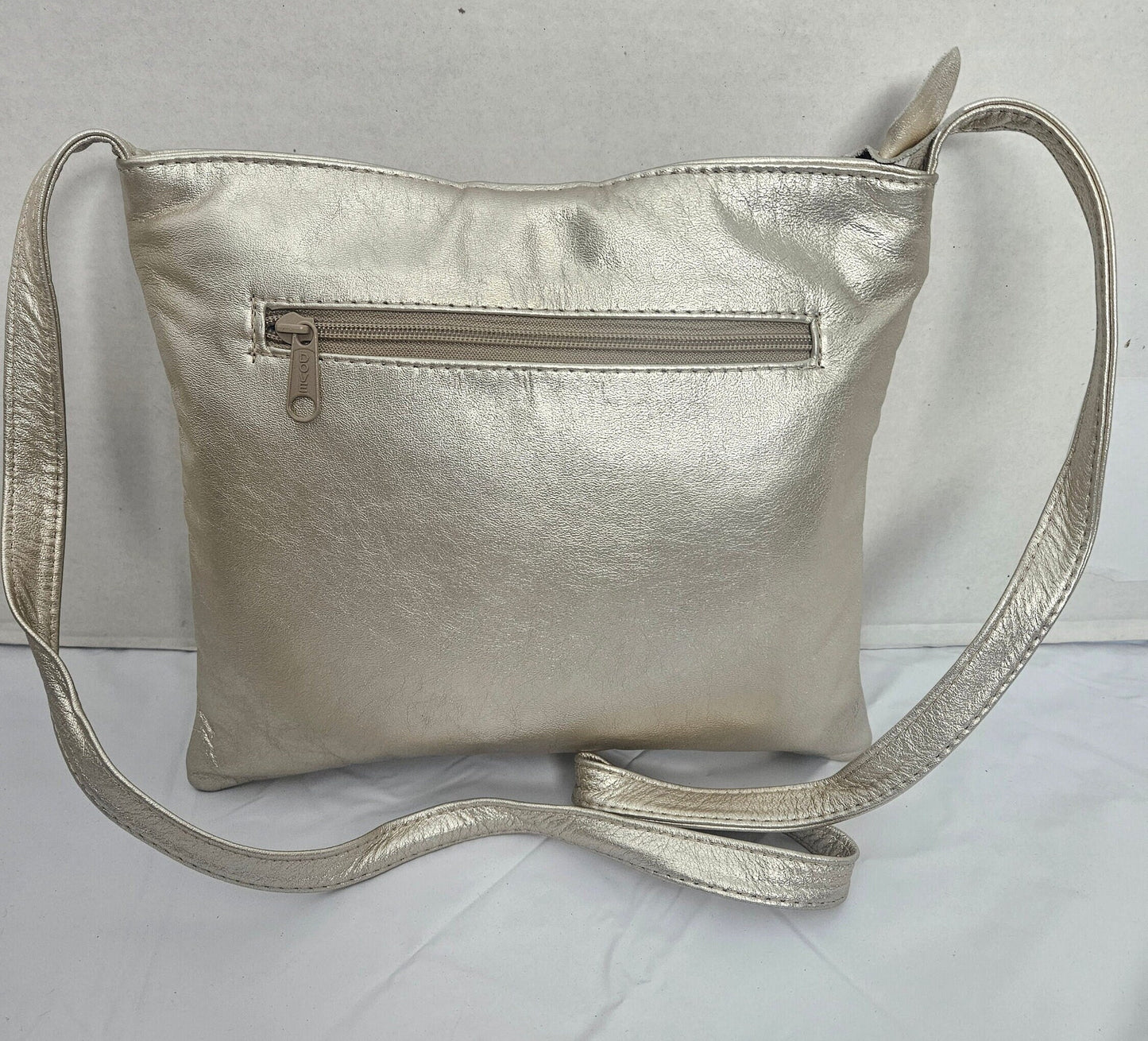 Shining cream with Gold matel Rings Genuine Leather Handbag for all. Tejrasila-Ring Purse. Made in USA. Design for you.