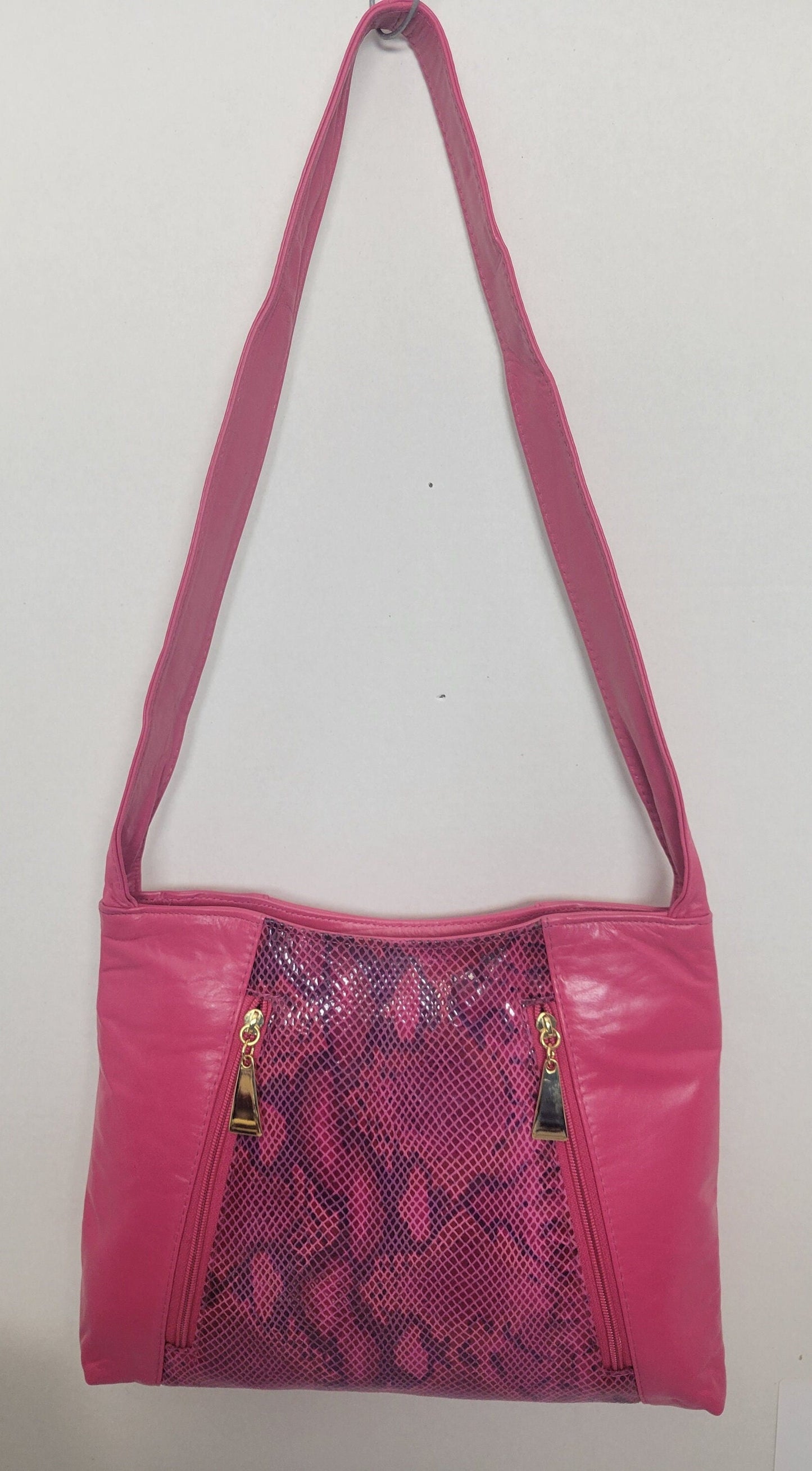 Fucha with Fucha print leather handbag! Two left and right pockets. Made in USA.