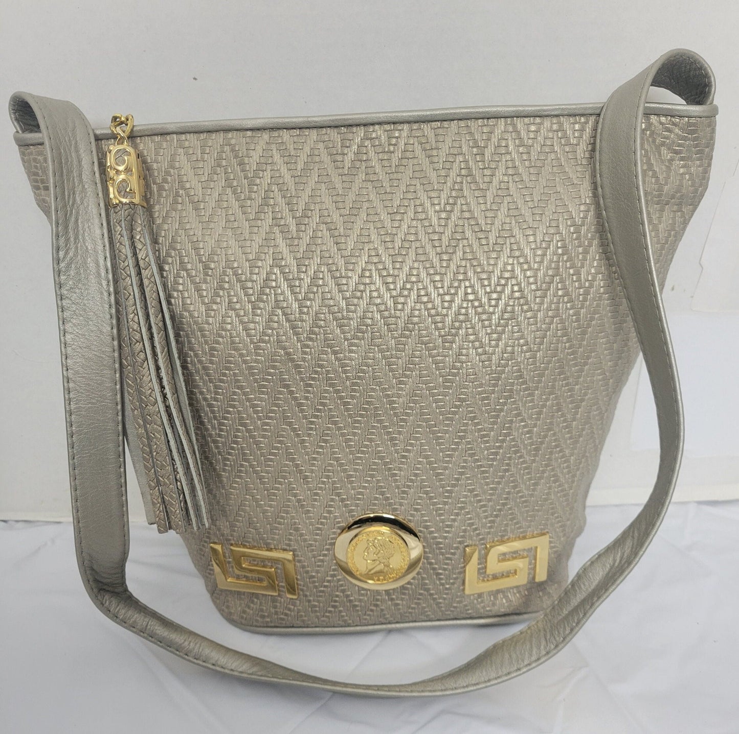 Mocha print with Gold Z and Coin metal design on Leather Shoulder Handbag for women. Design on front side only. Made In USA!