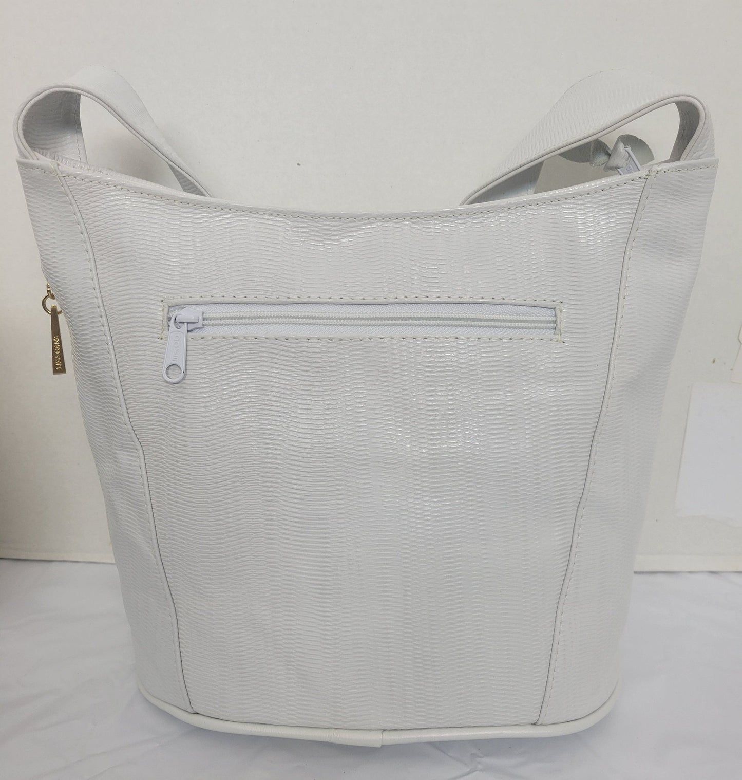 Tejrasila-Beautiful White print genuine leather handbag! Three outside pockets.Made in USA!