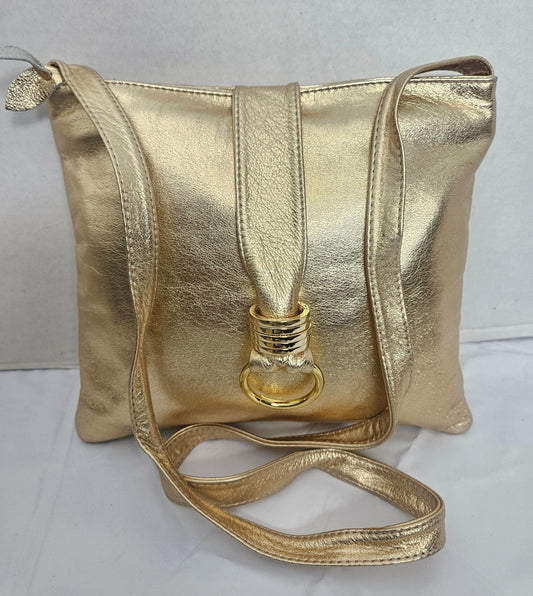 Shinning Gold with Gold matel Rings Genuine Leather Handbag for all. Tejrasila-Ring Purse. Made in USA. Design for you.