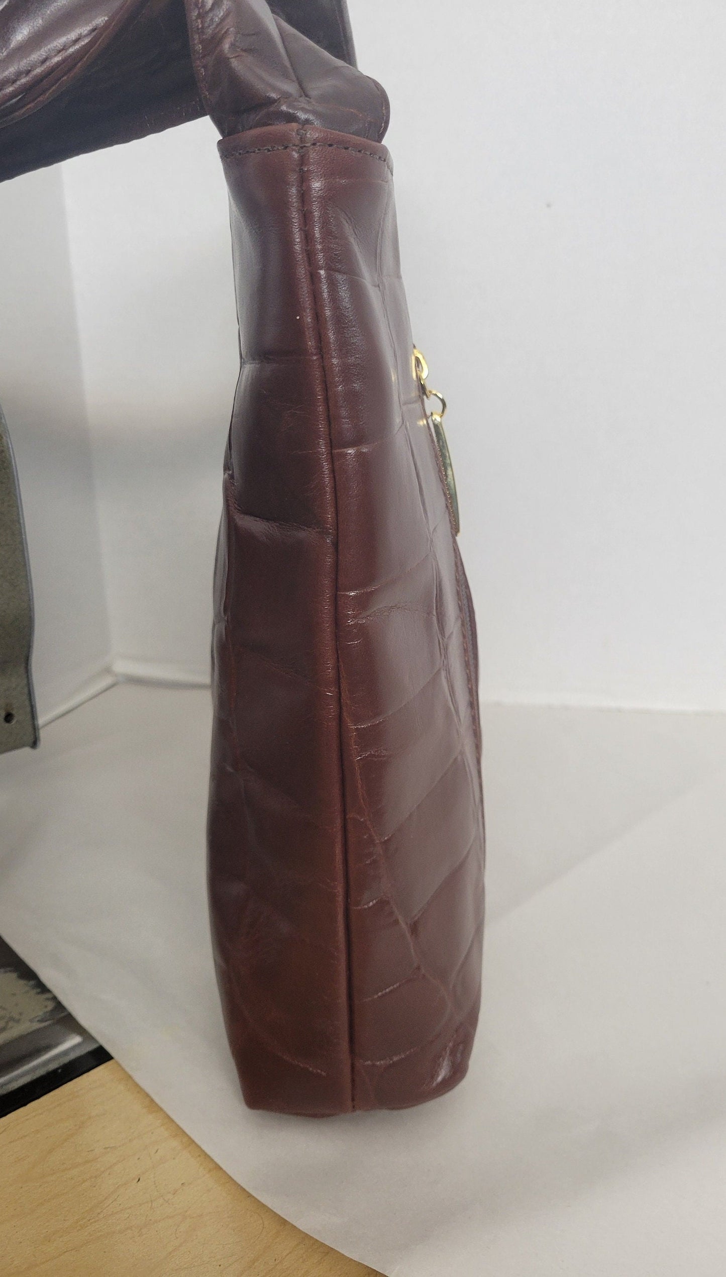 Brown print leather handbag! Two left and right pockets. Made in USA.