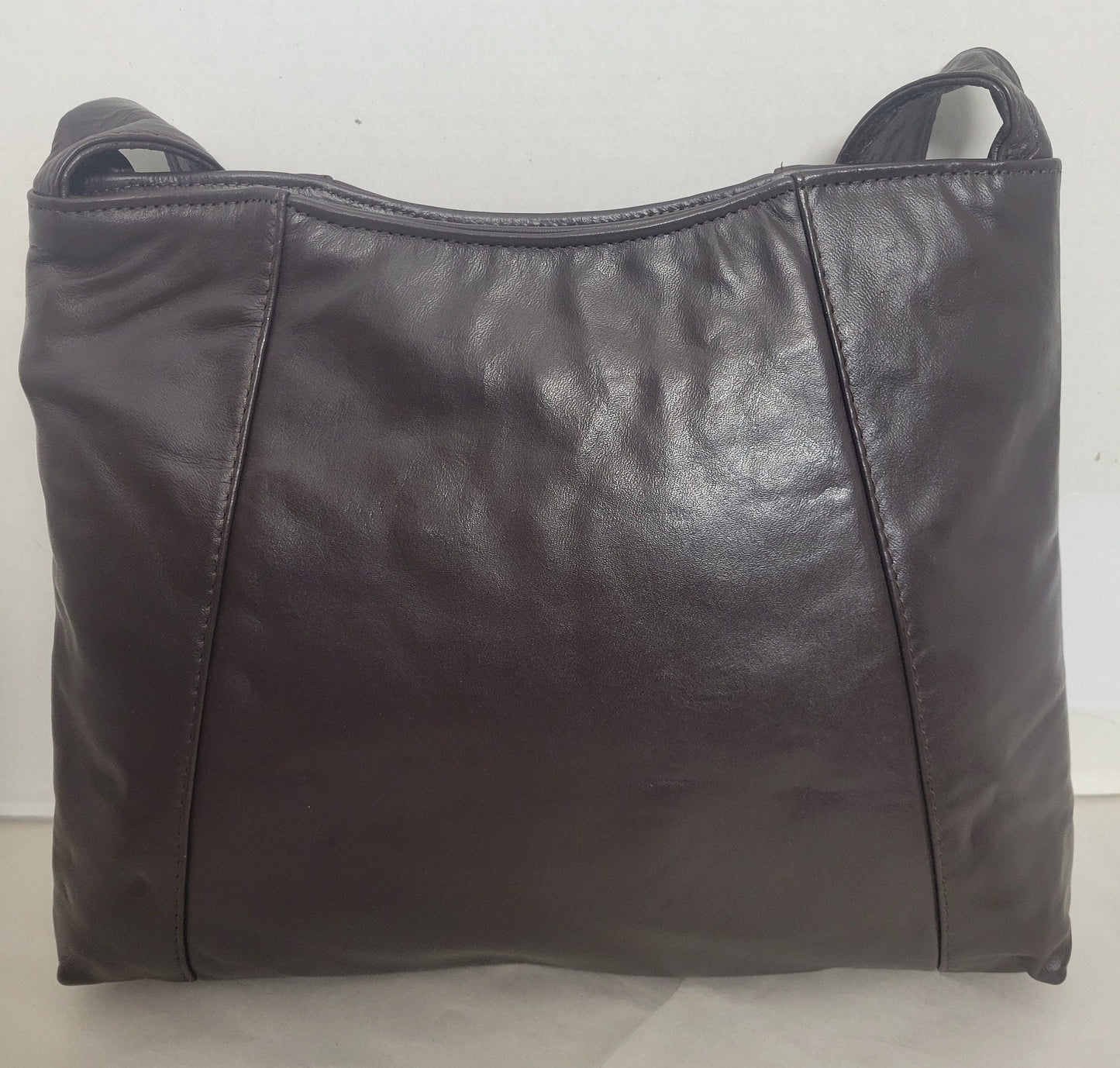 Brown leather handbag! Two left and right pockets. Made in USA.