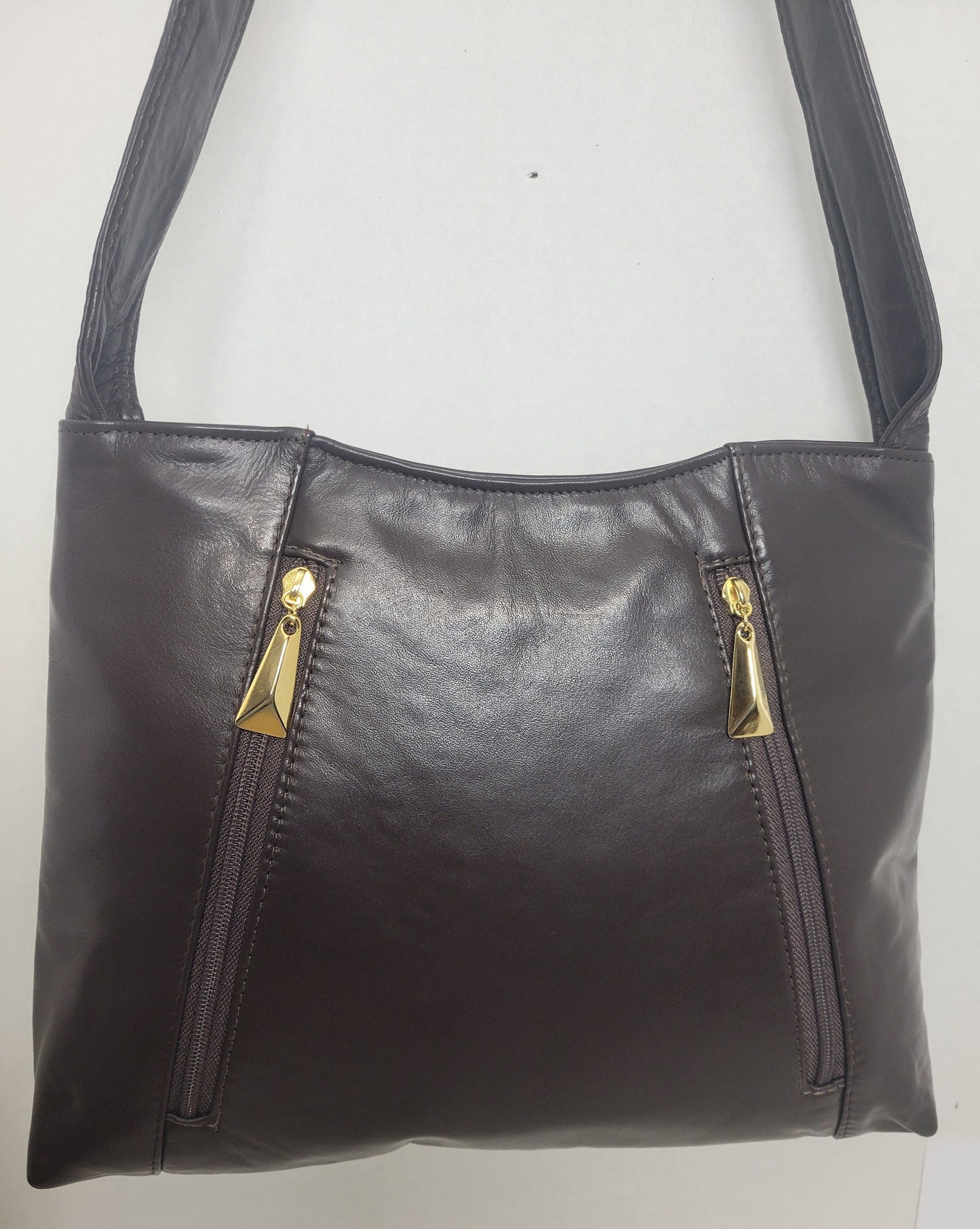 Brown leather handbag! Two left and right pockets. Made in USA.