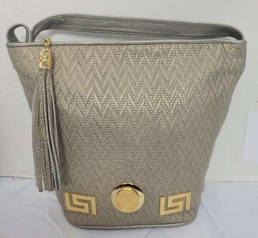 Mocha print with Gold Z and Coin metal design on Leather Shoulder Handbag for women. Design on front side only. Made In USA!