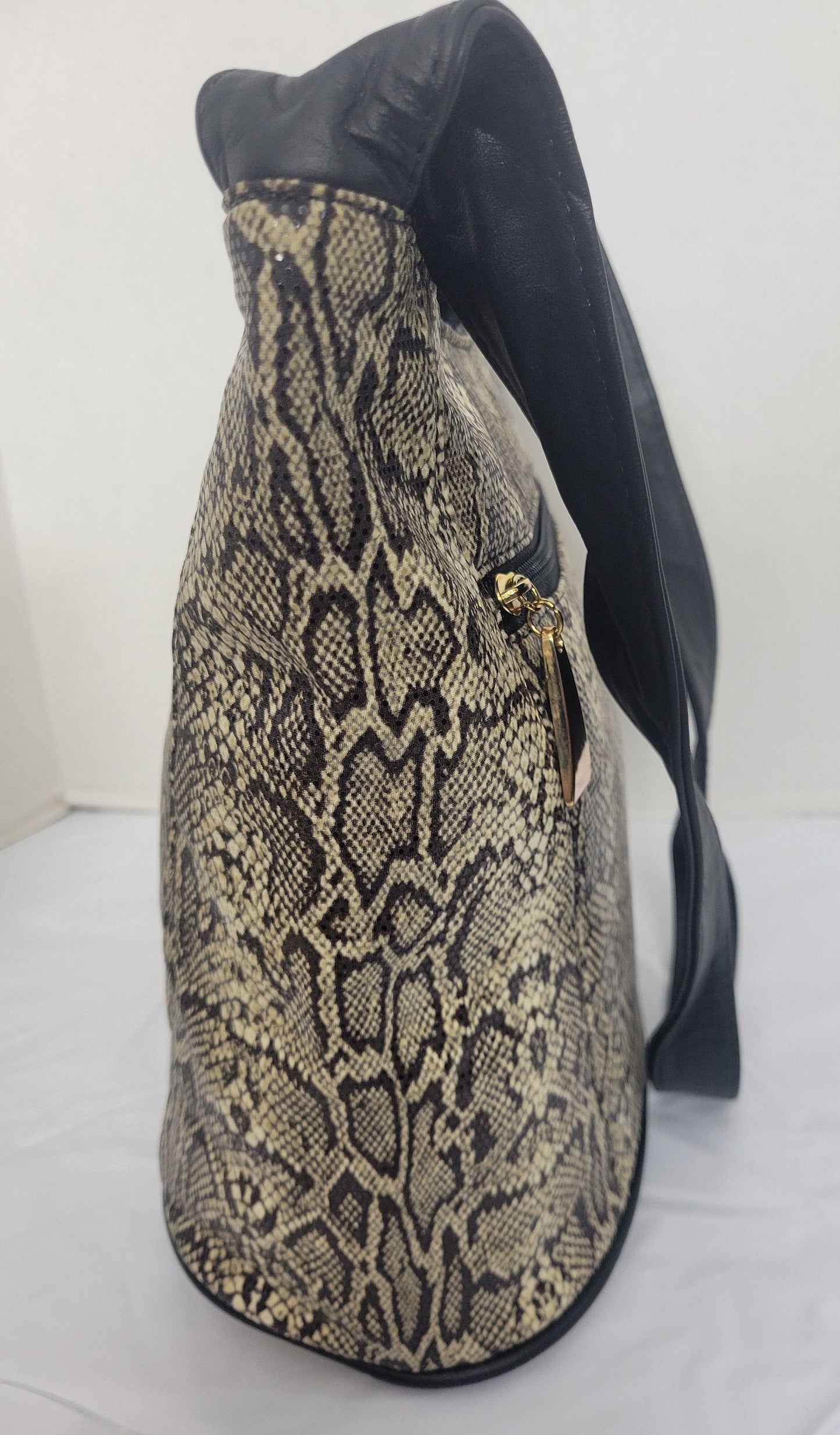 Tejrasila-Black with brown mix snake print fabric with genuine leather Shoulder handbag! Three outside pockets.Made in USA!